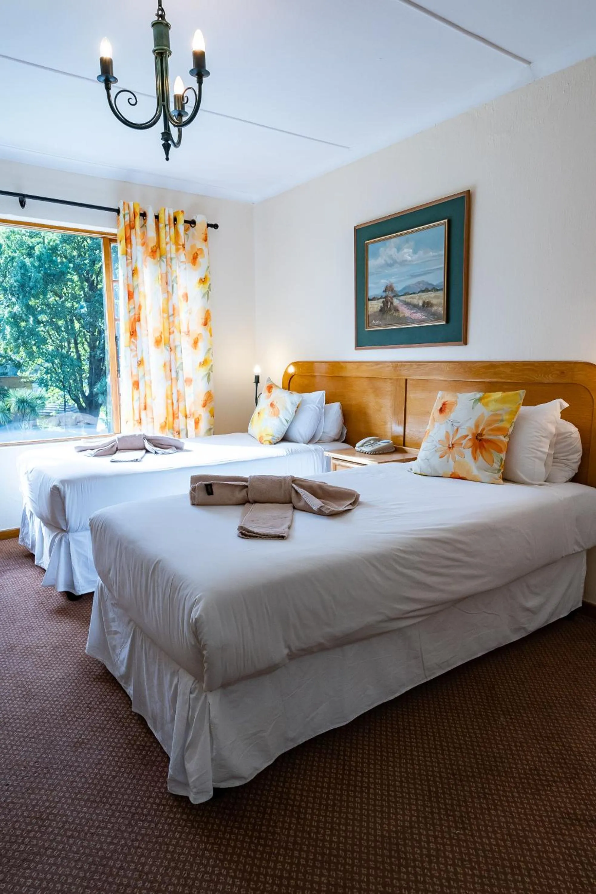 Photo of the whole room, Bed in Gooderson Drakensberg Gardens Golf & Spa Resort