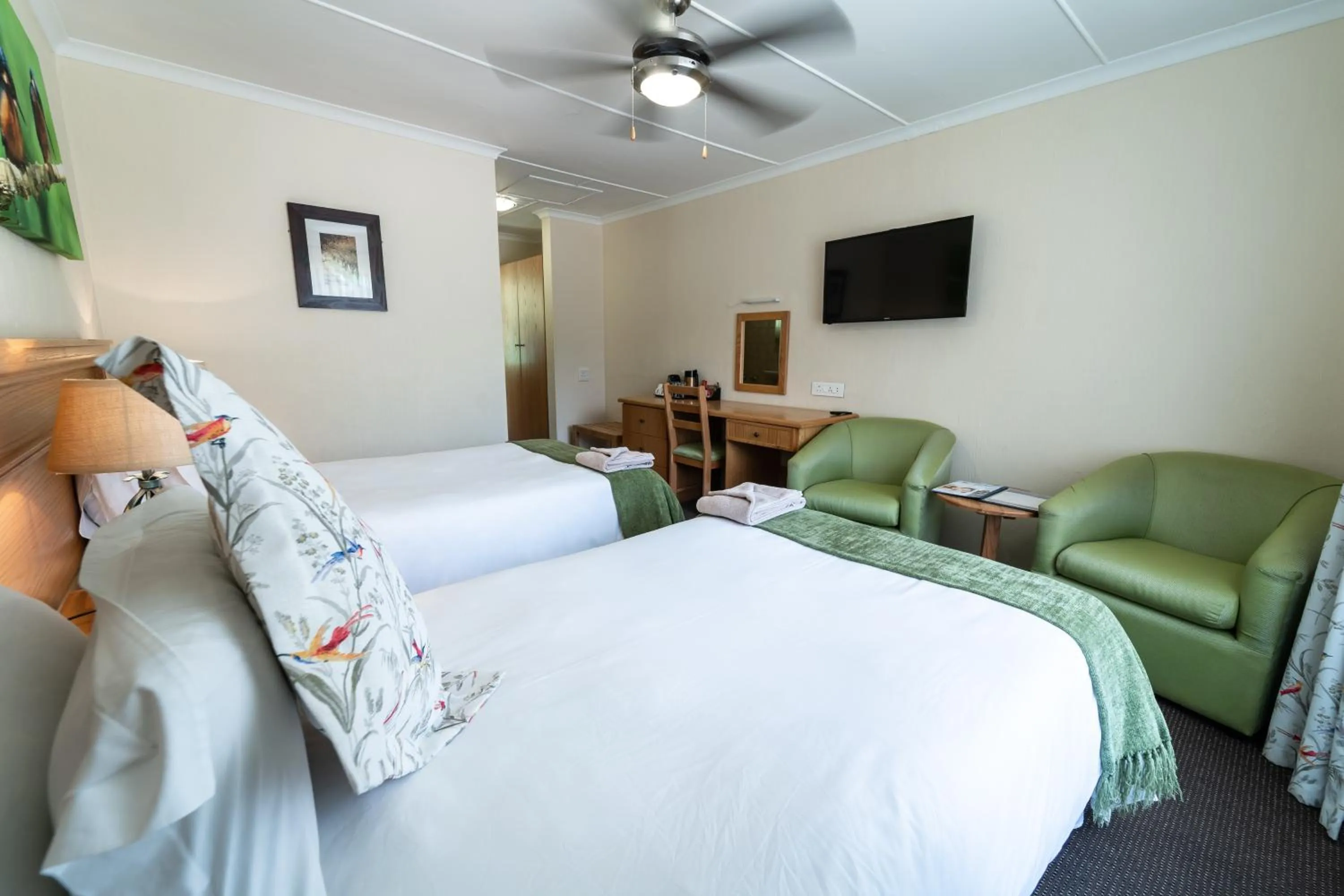 Photo of the whole room, Bed in Gooderson Drakensberg Gardens Golf & Spa Resort