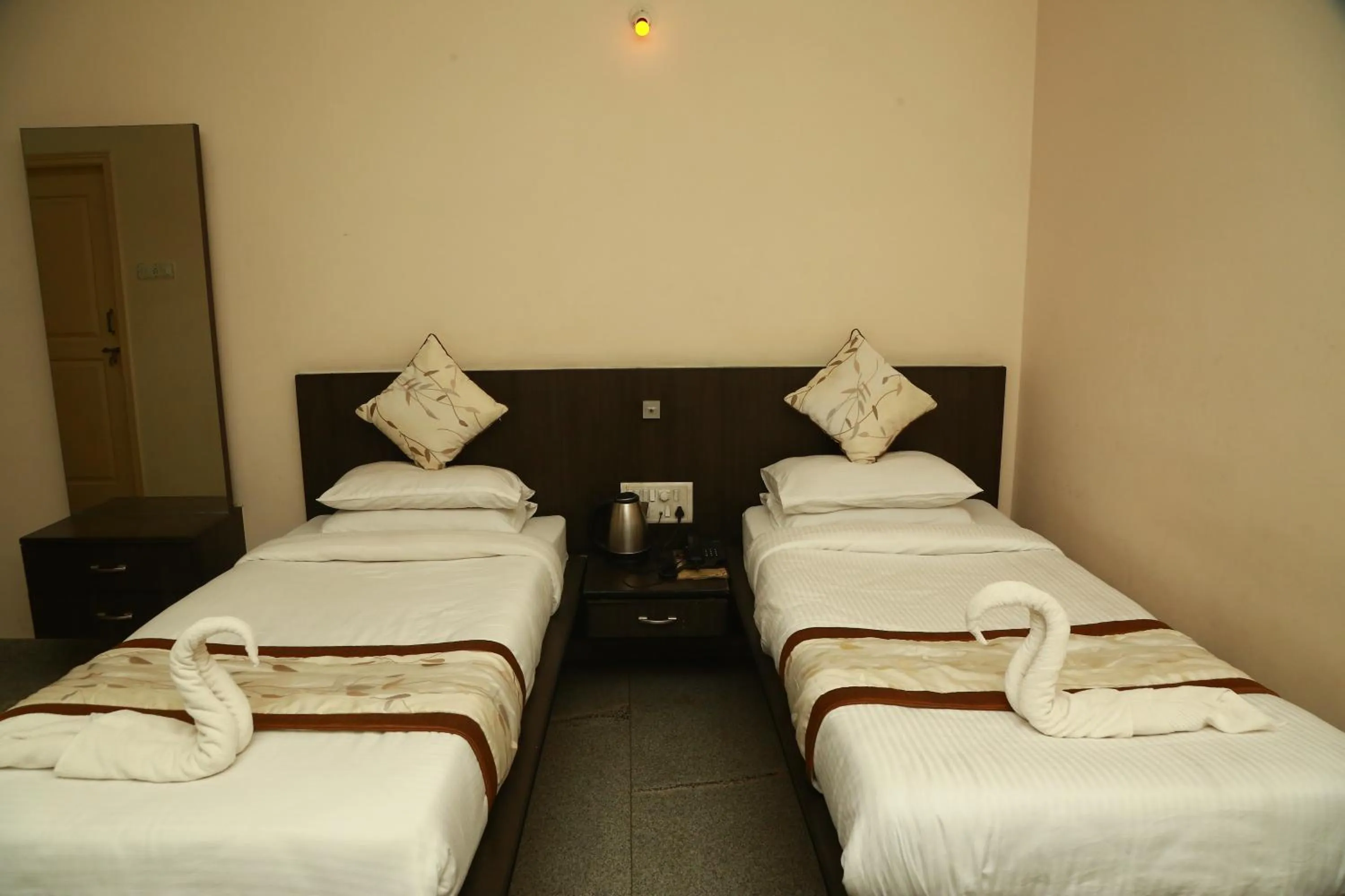 Bed in Soundarya Hotel