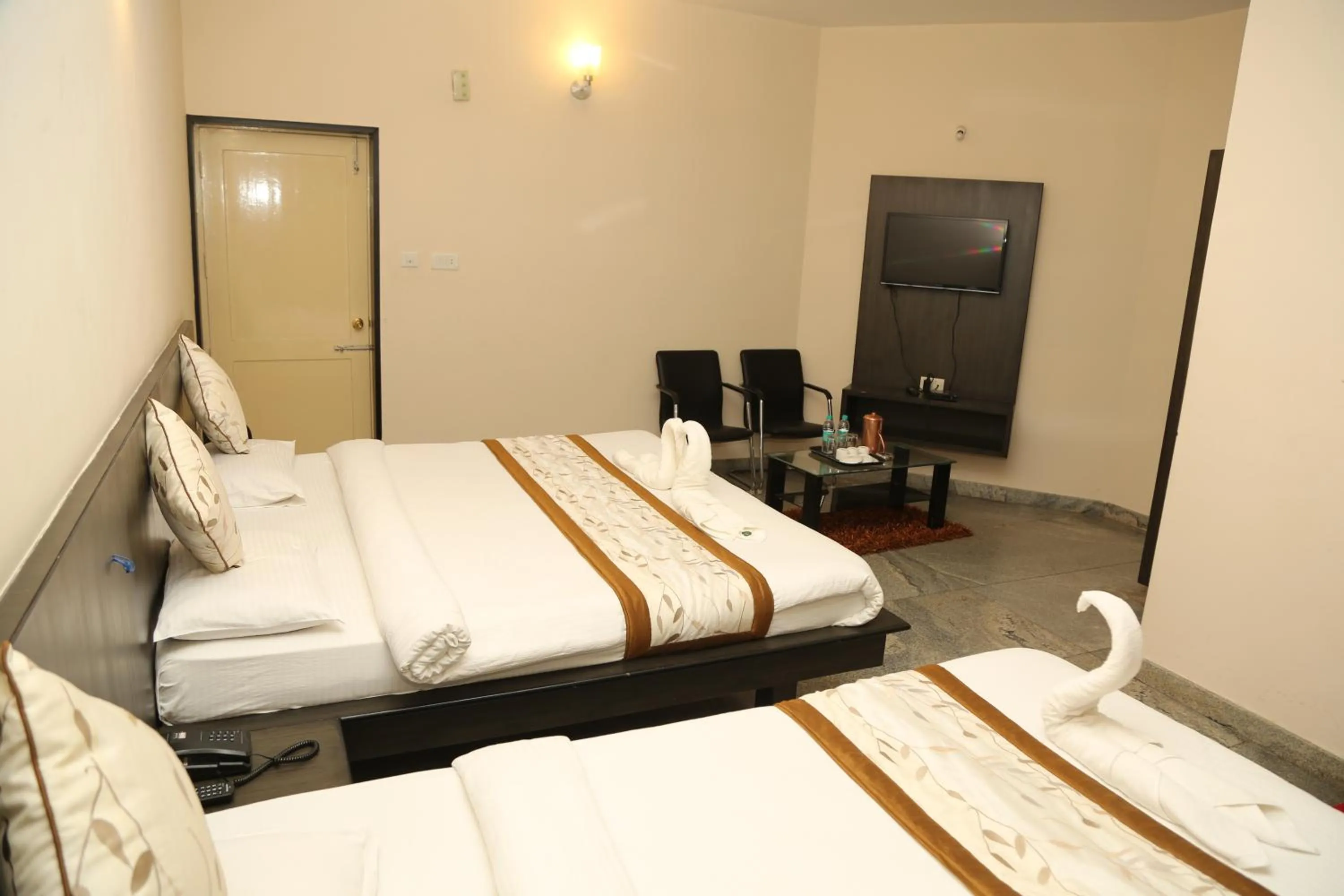 Bed in Soundarya Hotel