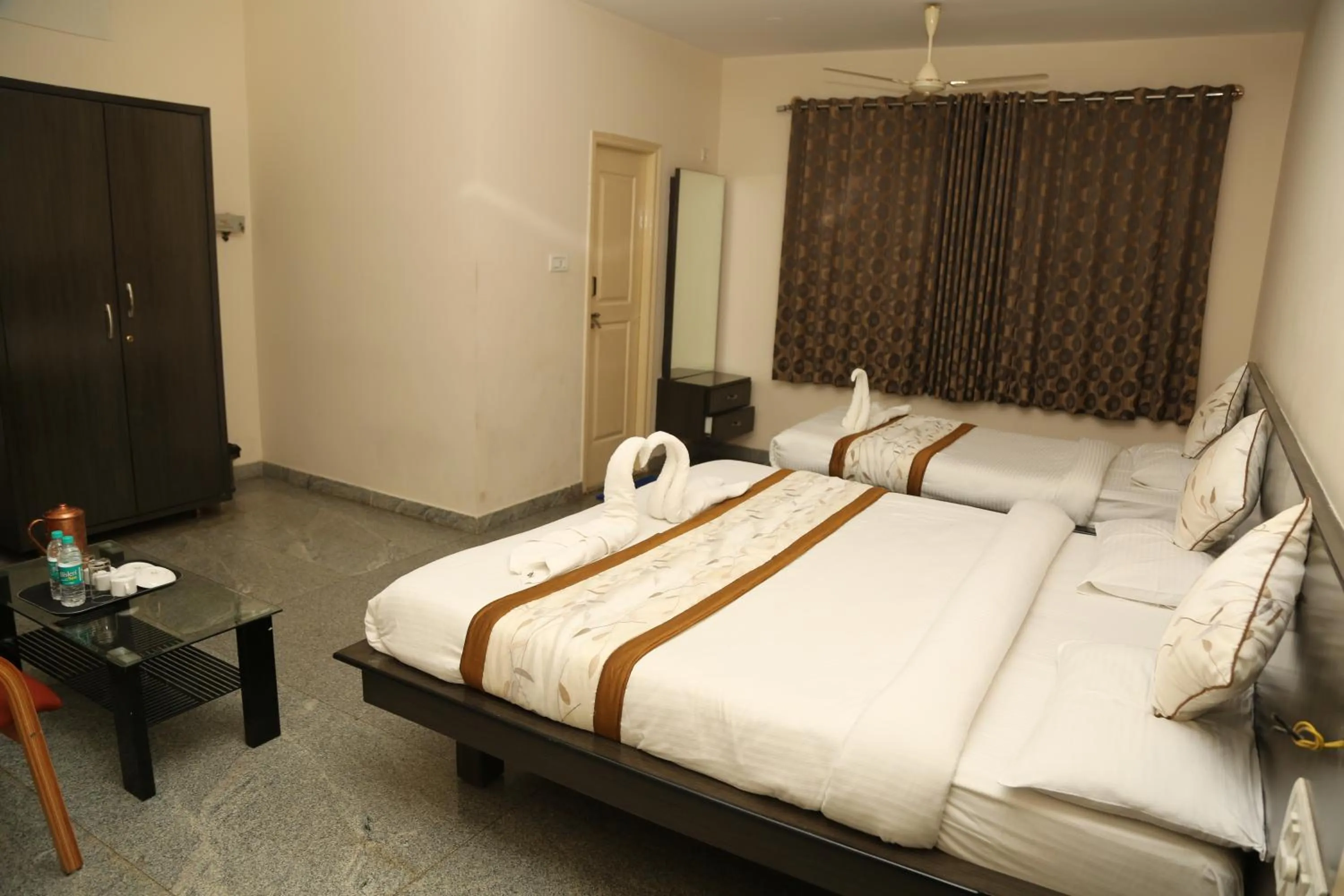 Bed in Soundarya Hotel