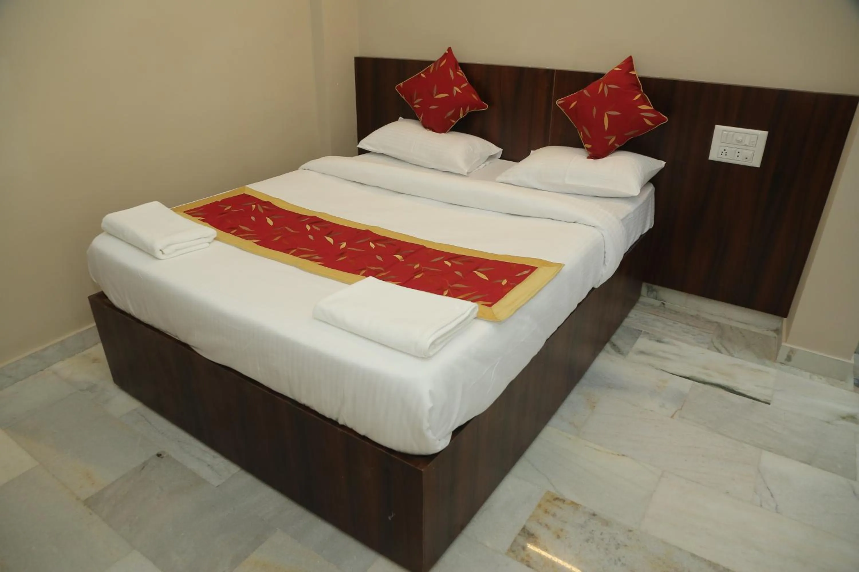 Bed in Soundarya Hotel