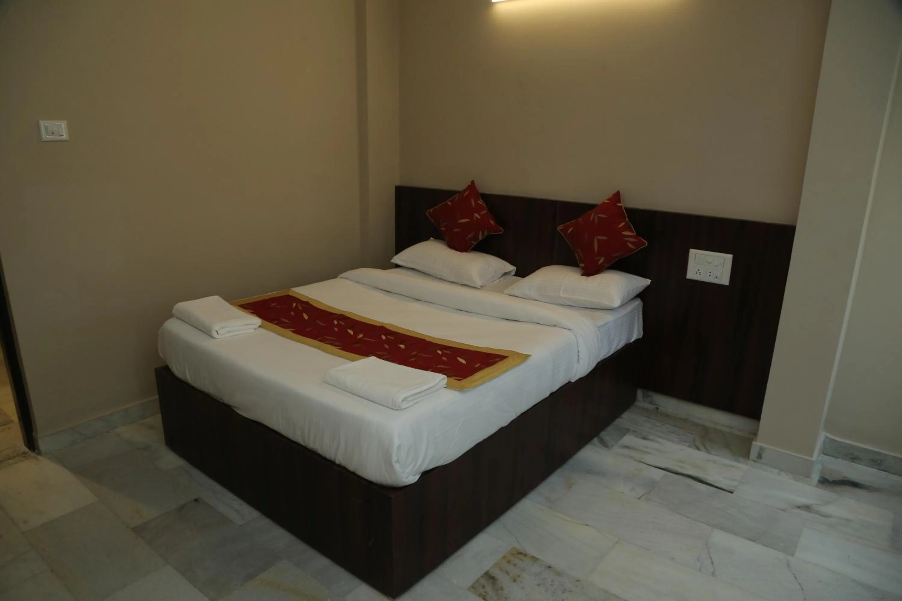 Bed in Soundarya Hotel
