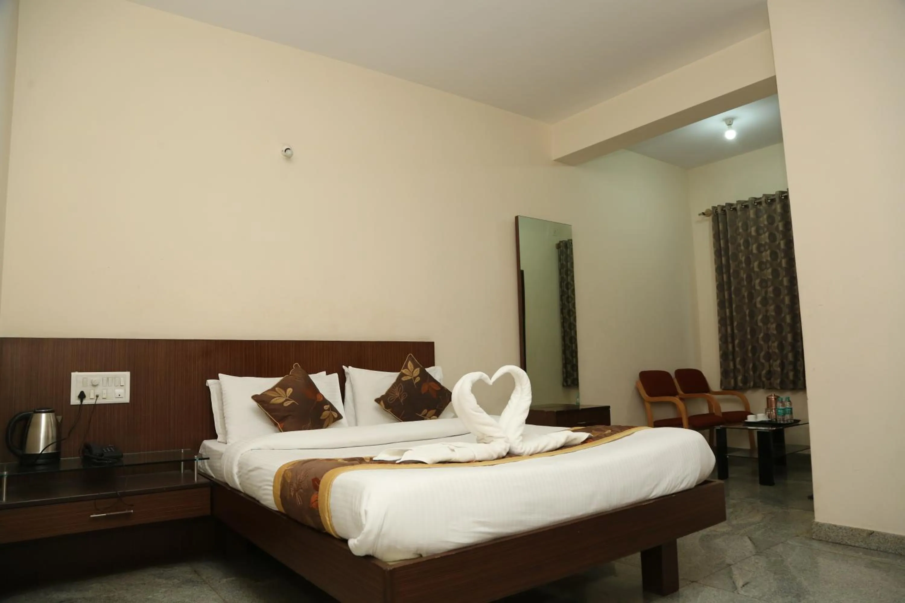 Bed in Soundarya Hotel
