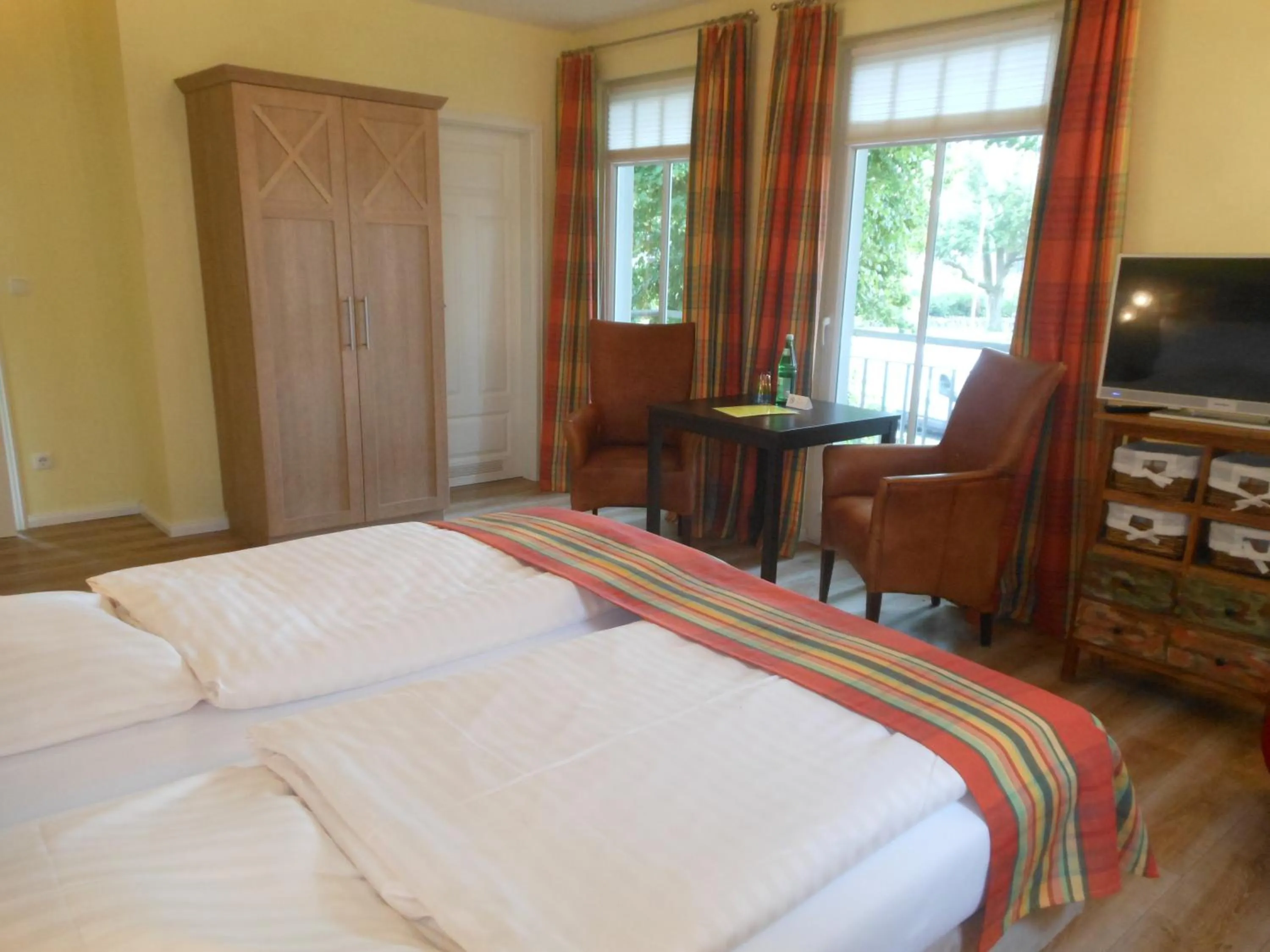 Photo of the whole room, Bed in Landhaus Hammoor Stieper Gastronomie GmbH