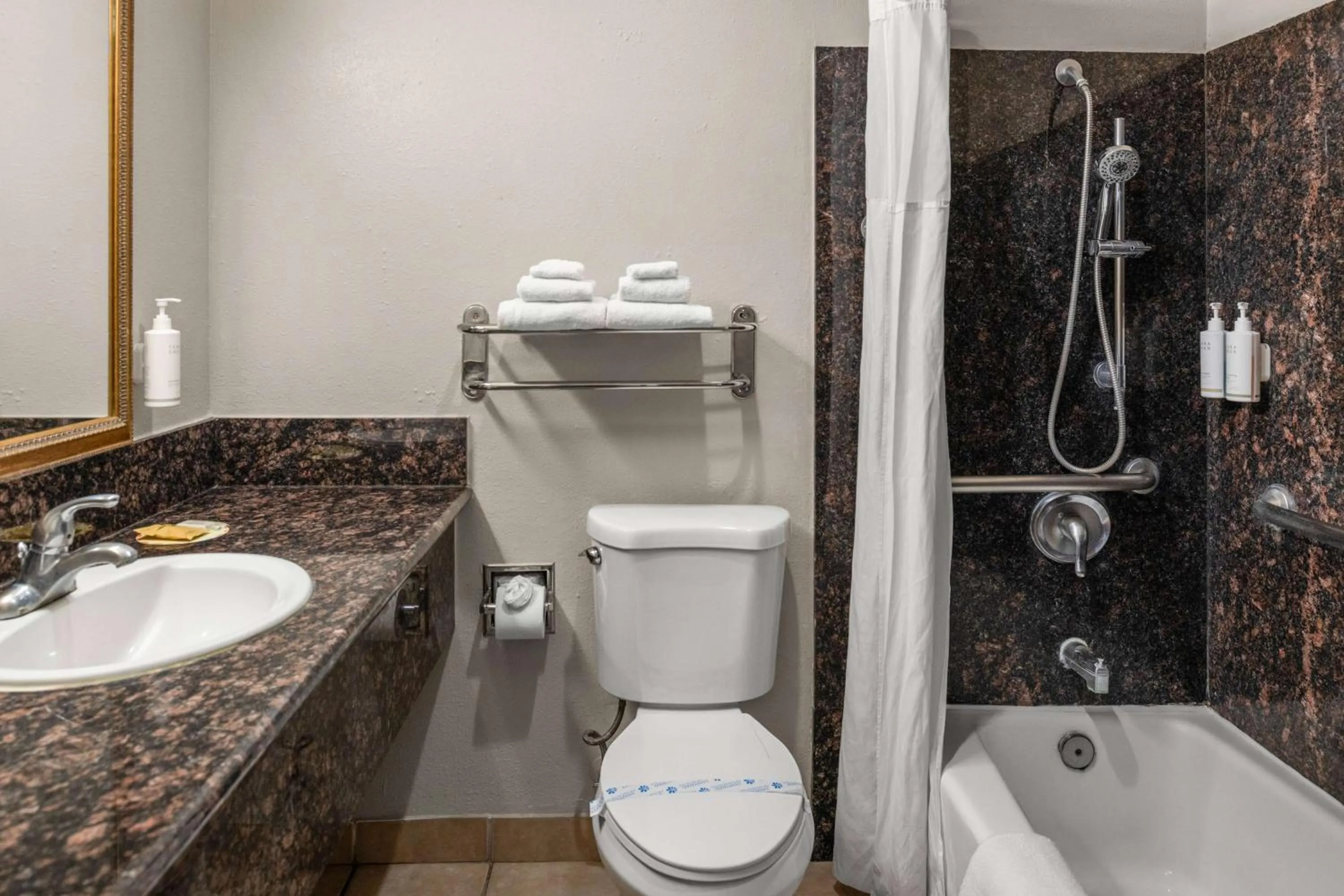 Bathroom in Days Inn & Suites by Wyndham Artesia
