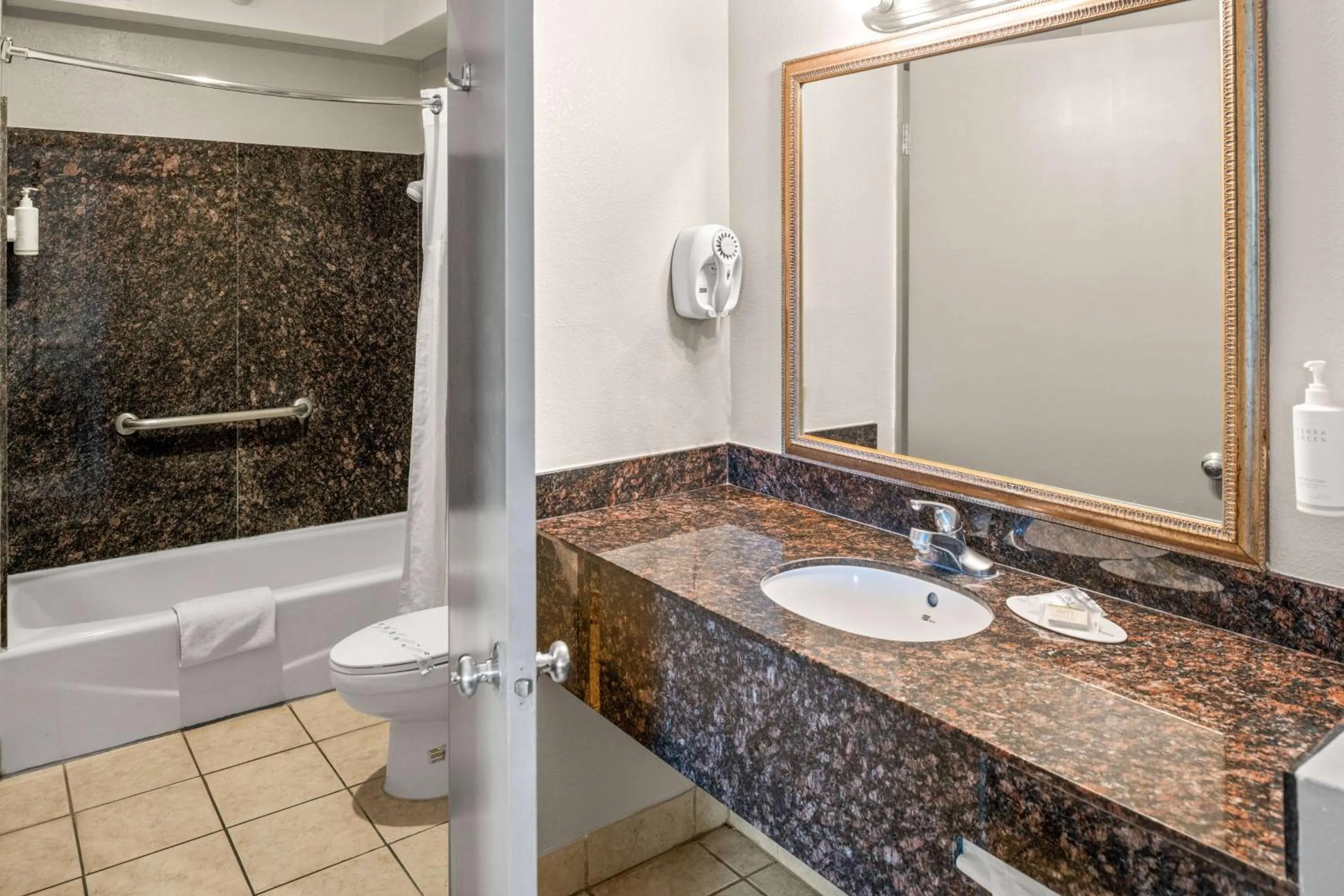 Bathroom in Days Inn & Suites by Wyndham Artesia