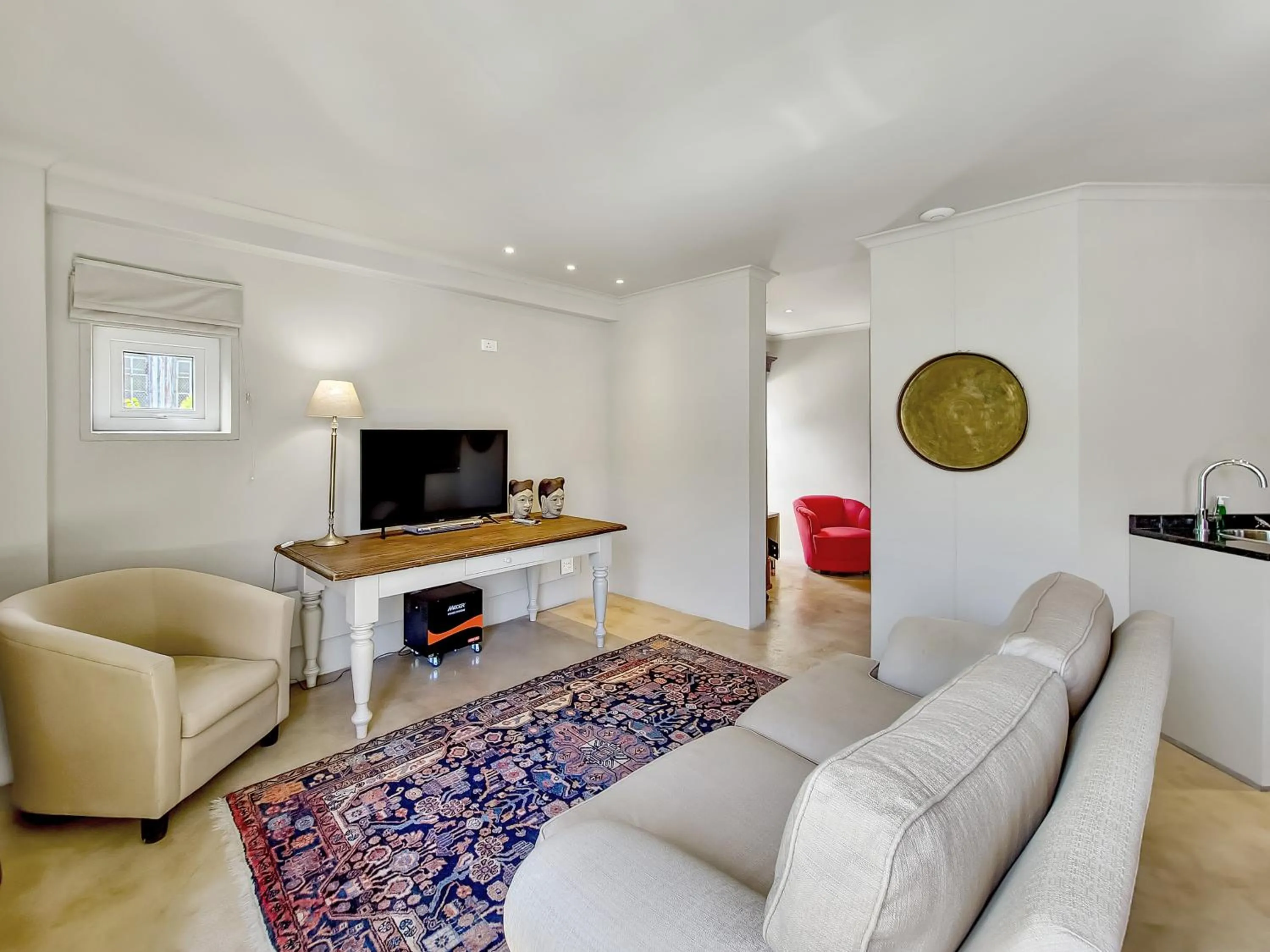 Seating area in Rouge on Rose Boutique Hotel