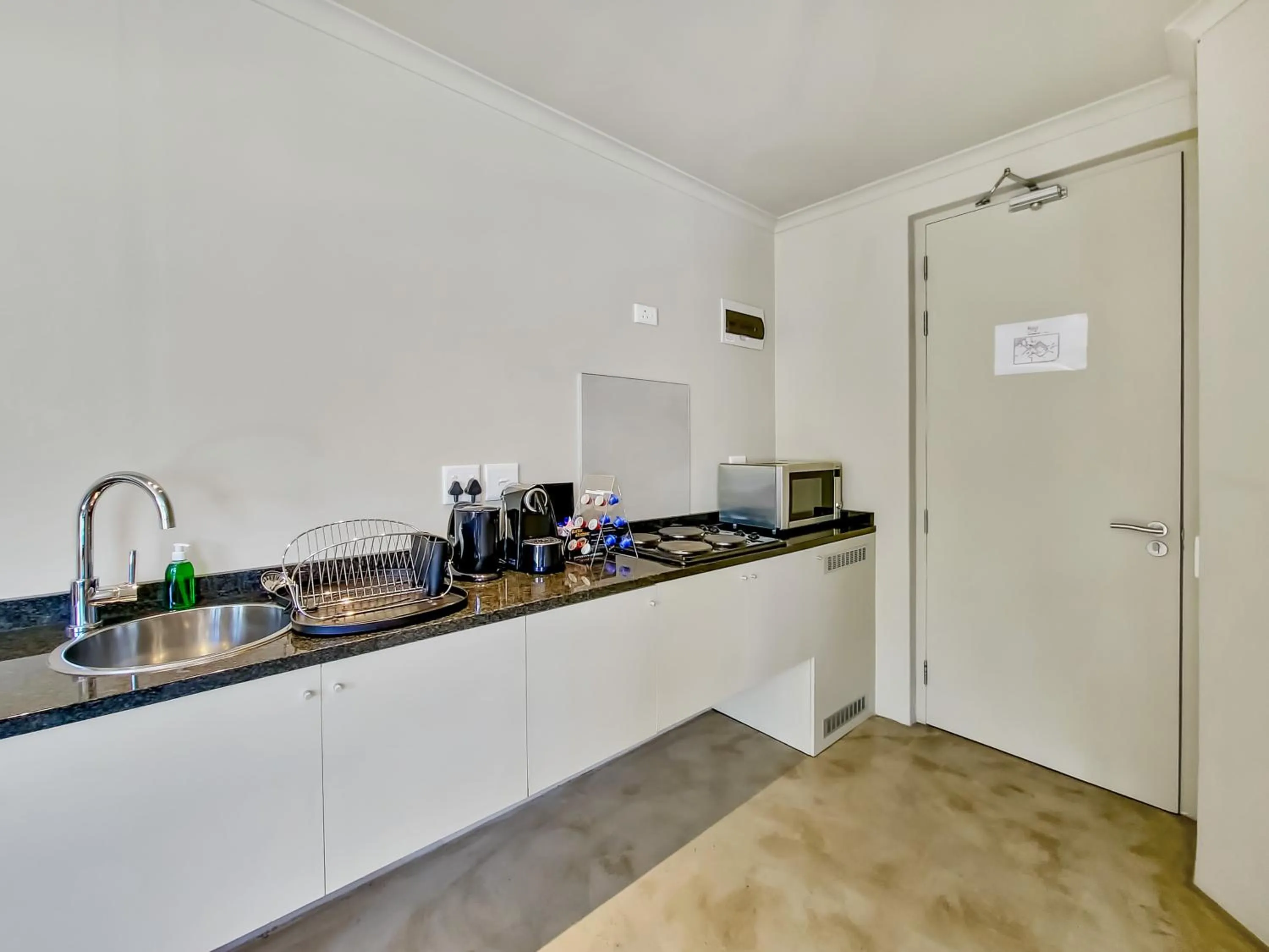 Kitchen or kitchenette in Rouge on Rose Boutique Hotel