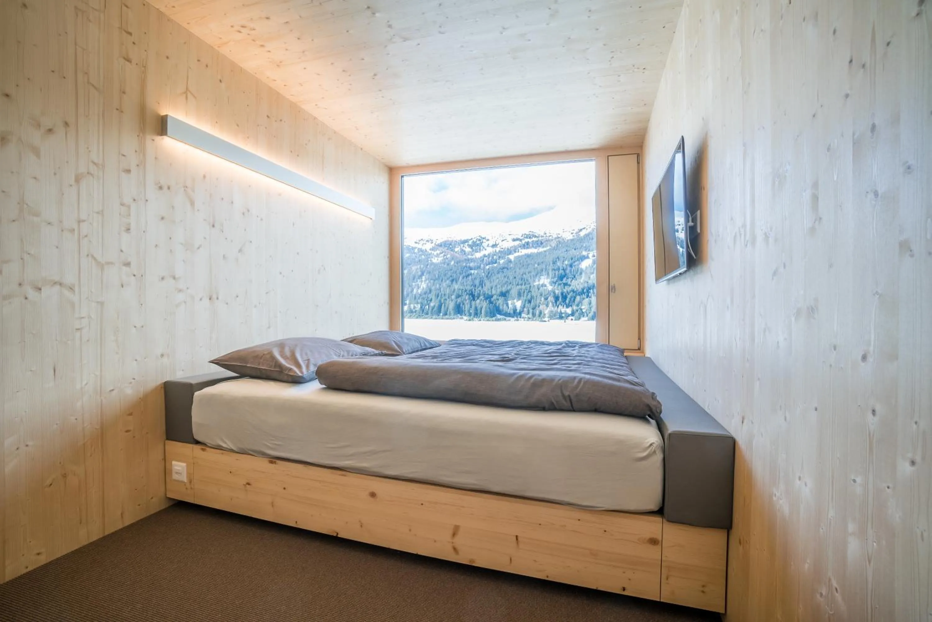Photo of the whole room, Bed in Revier Mountain Lodge Lenzerheide