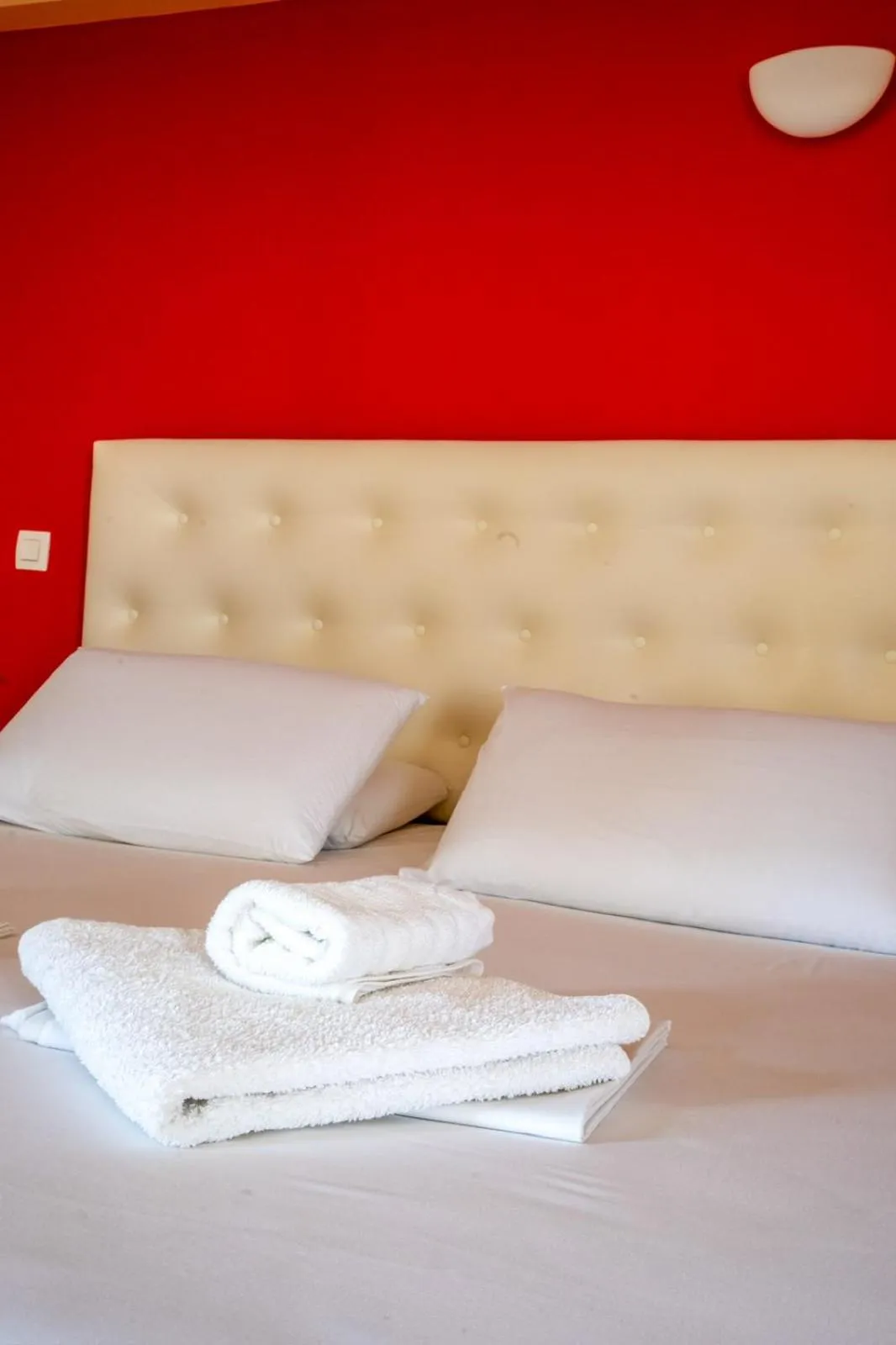 Property building, Bed in Coralli Hotel