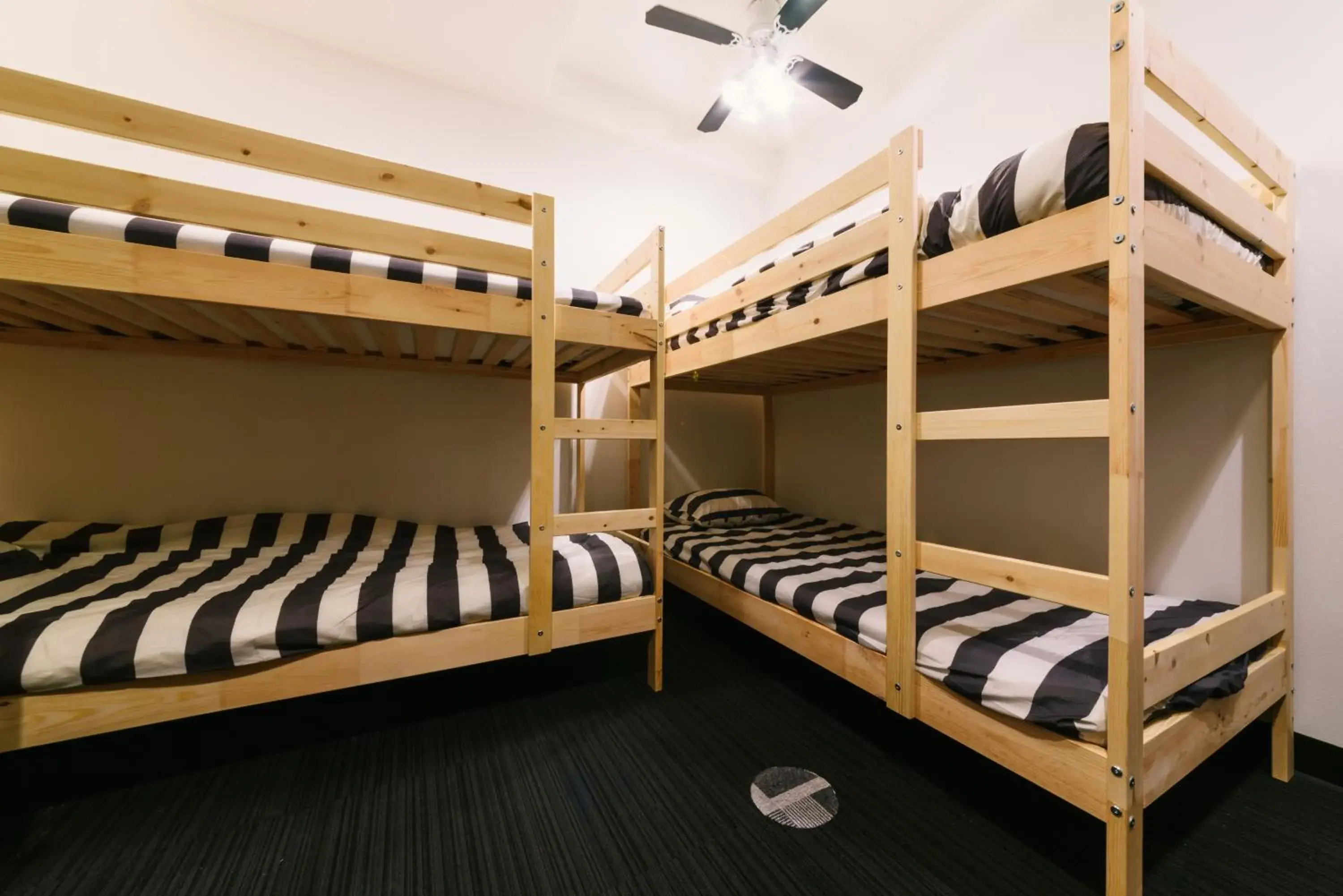 Bed in Guest House Yasuragi Hakataekimae Bed in Guest House Yasuragi Hakataekimae