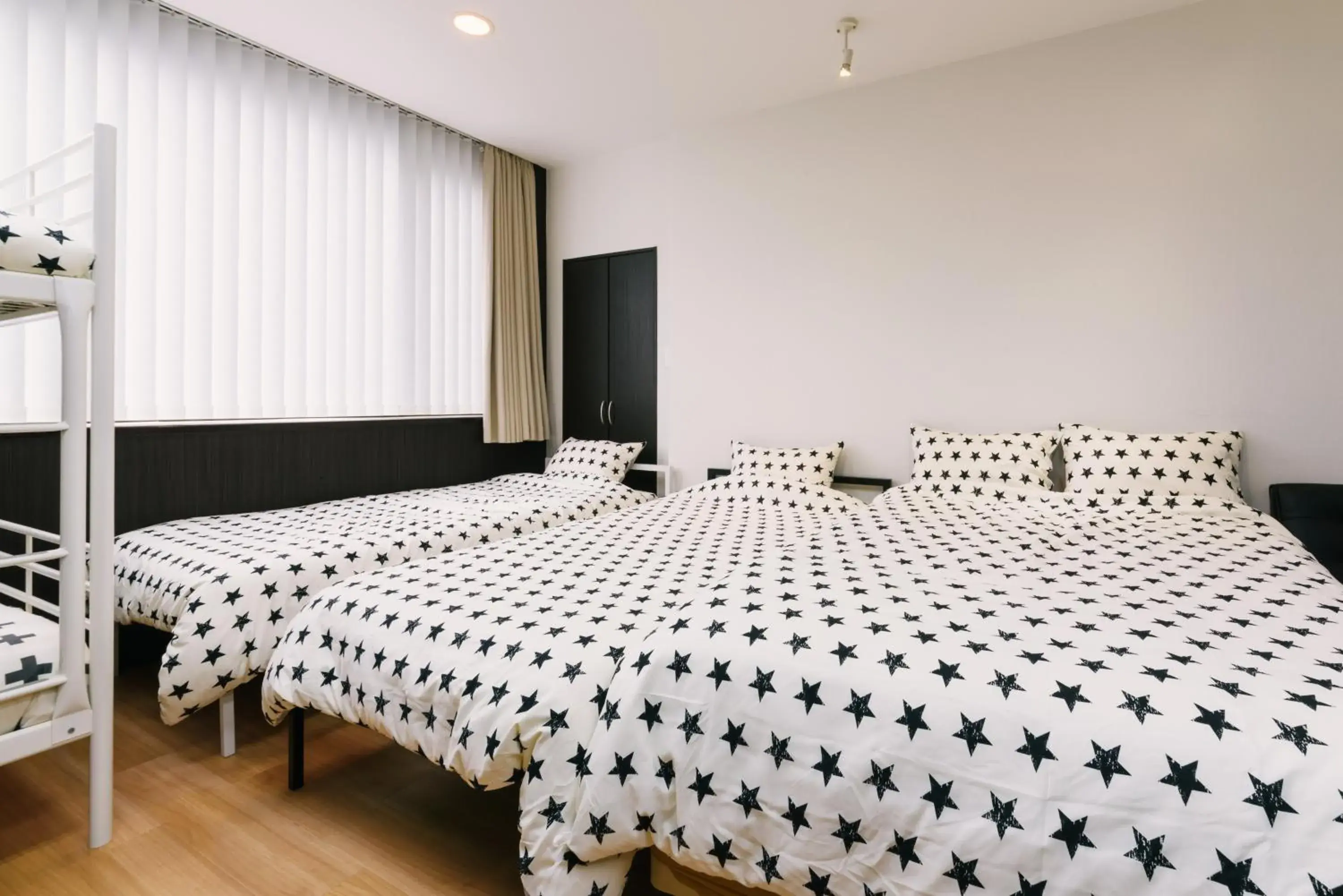 Bed in Guest House Yasuragi Hakataekimae Bed in Guest House Yasuragi Hakataekimae