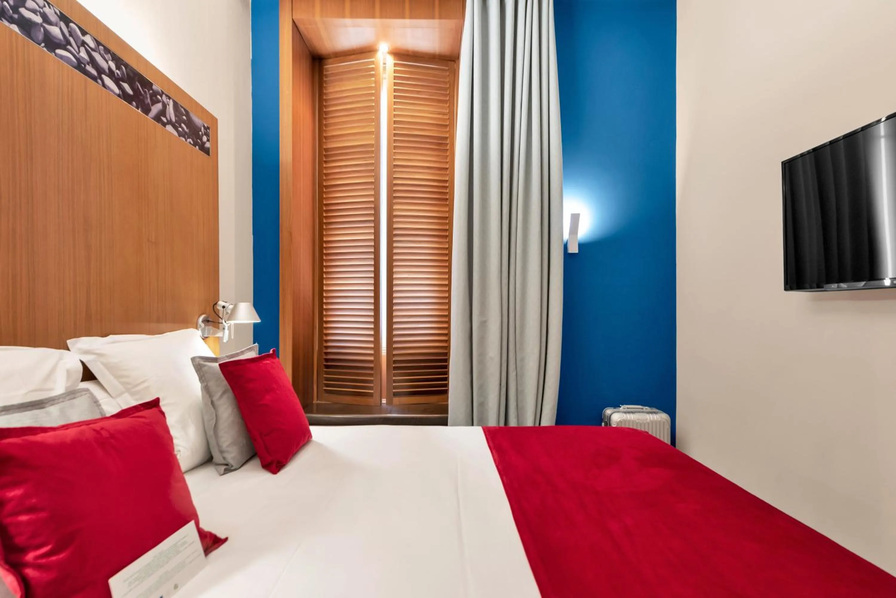 Bed in Hotel Beau Rivage