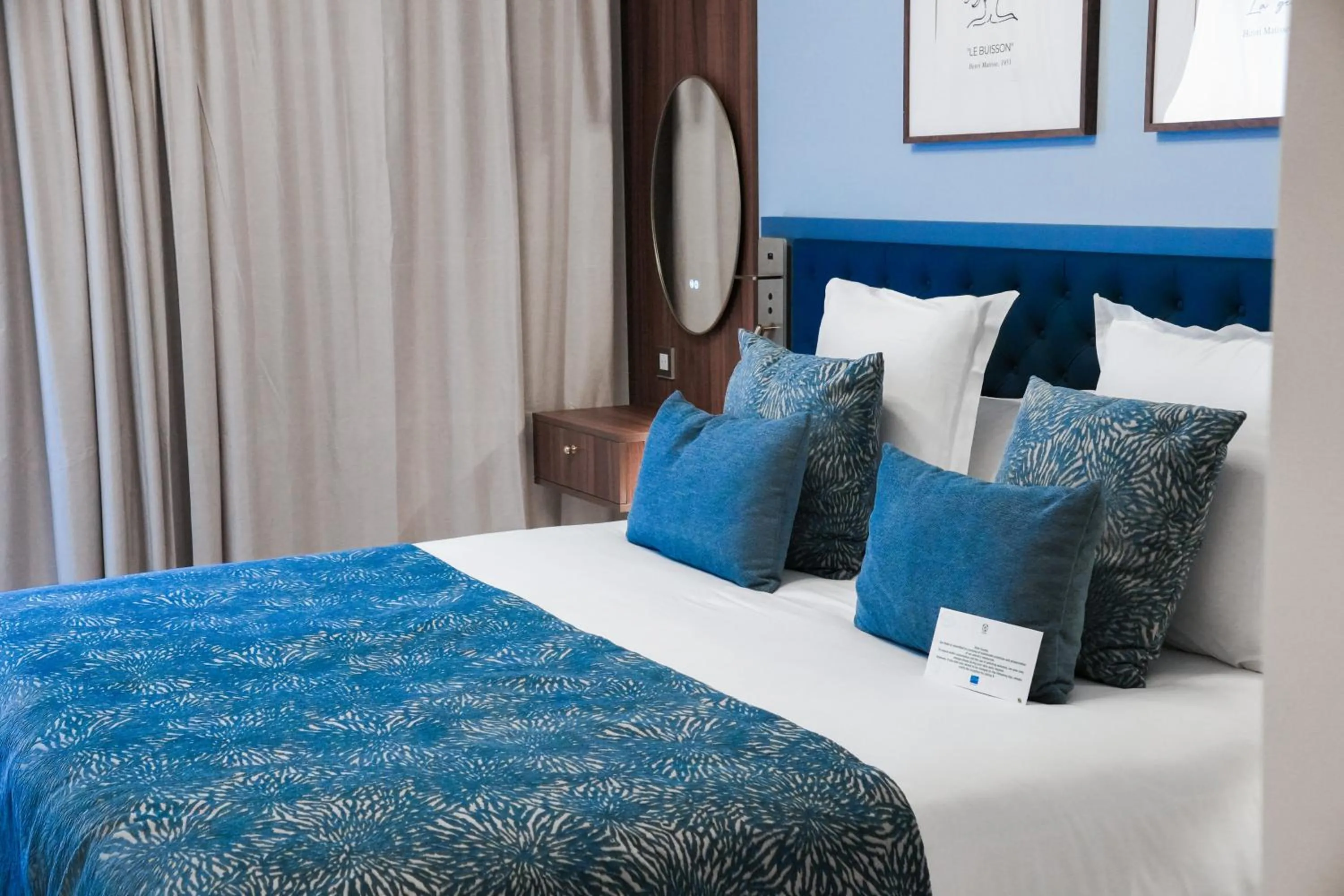 Bed in Hotel Beau Rivage