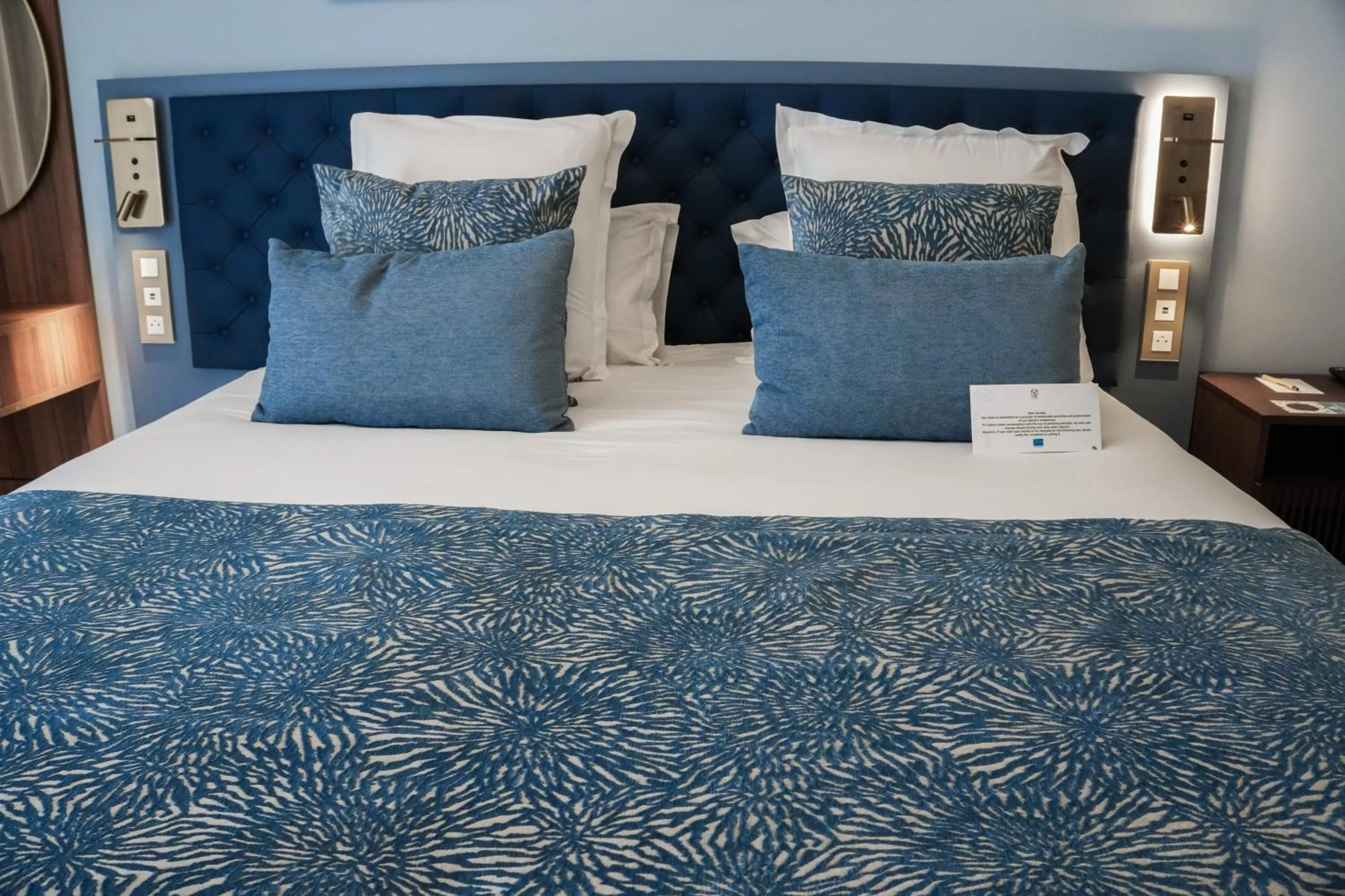 Bed in Hotel Beau Rivage