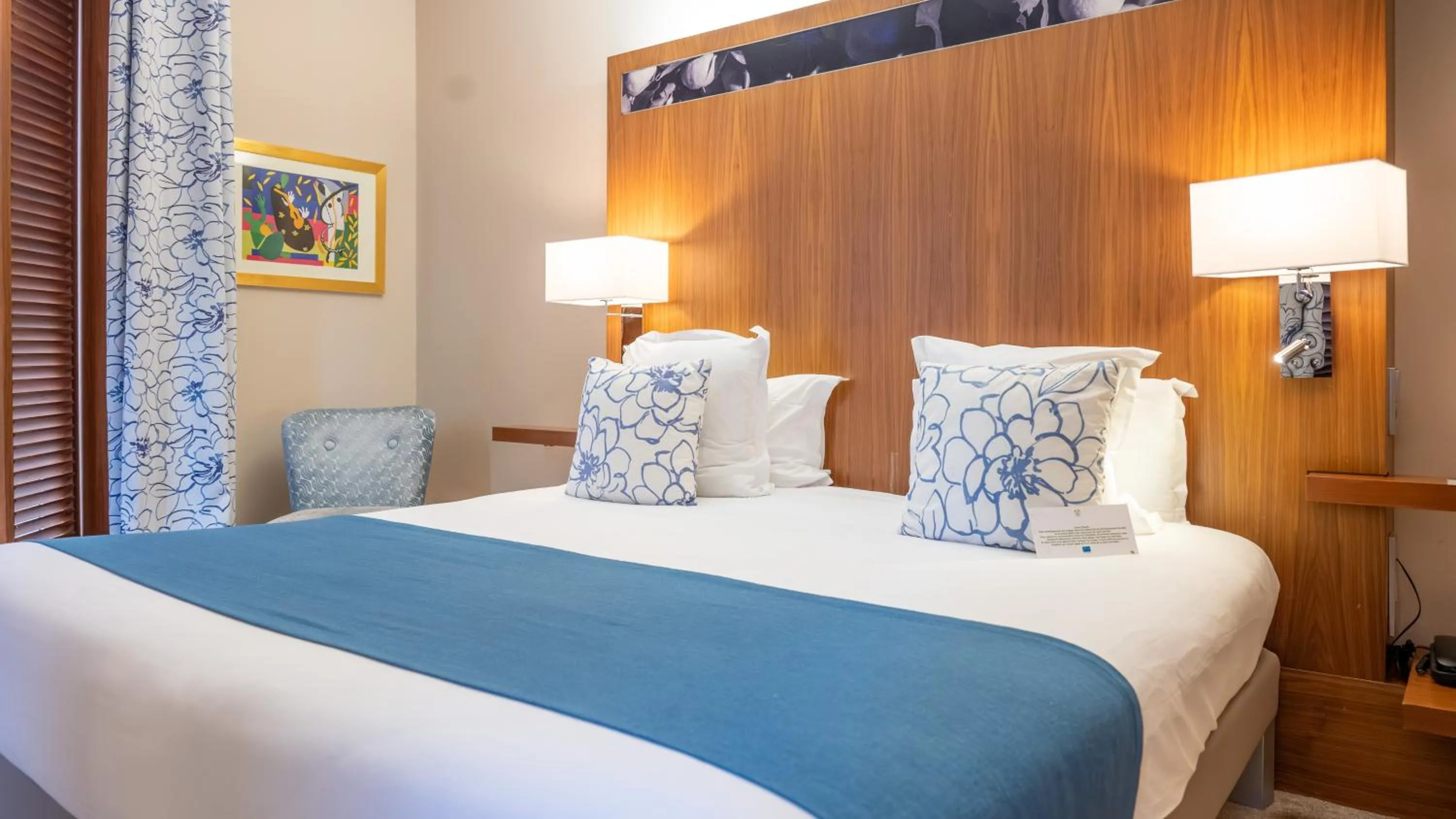 Bed in Hotel Beau Rivage