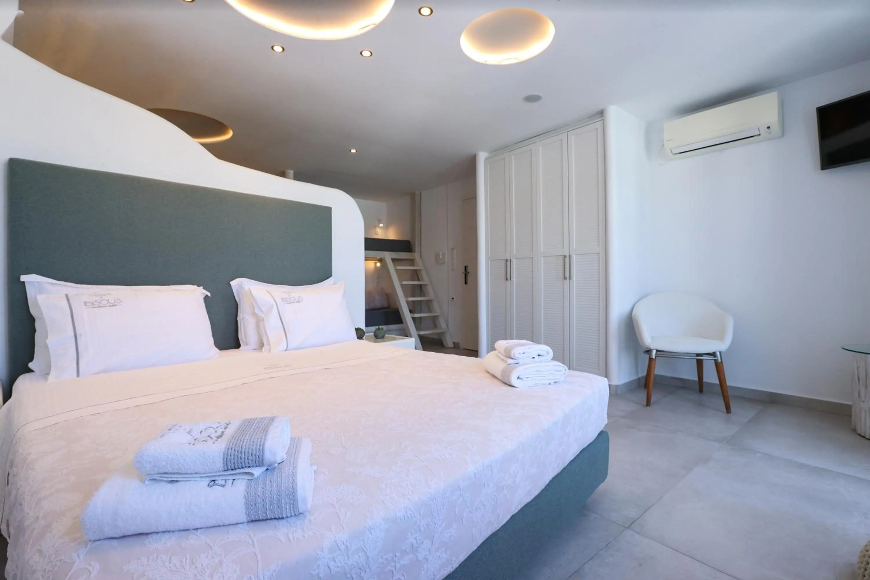 TV and multimedia, Bed in Ibiscus Boutique