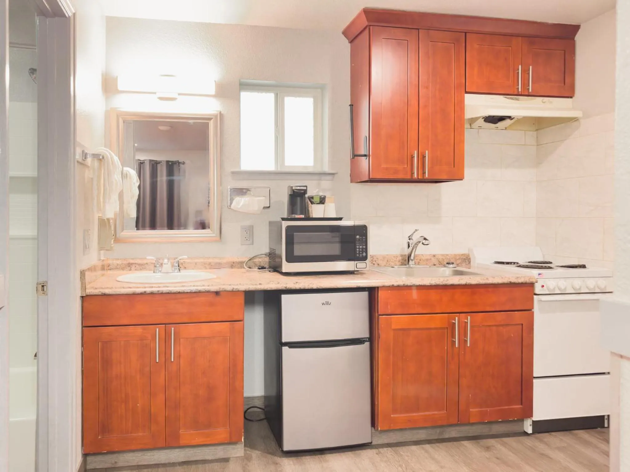 Kitchen or kitchenette in Americas Inn & Suite
