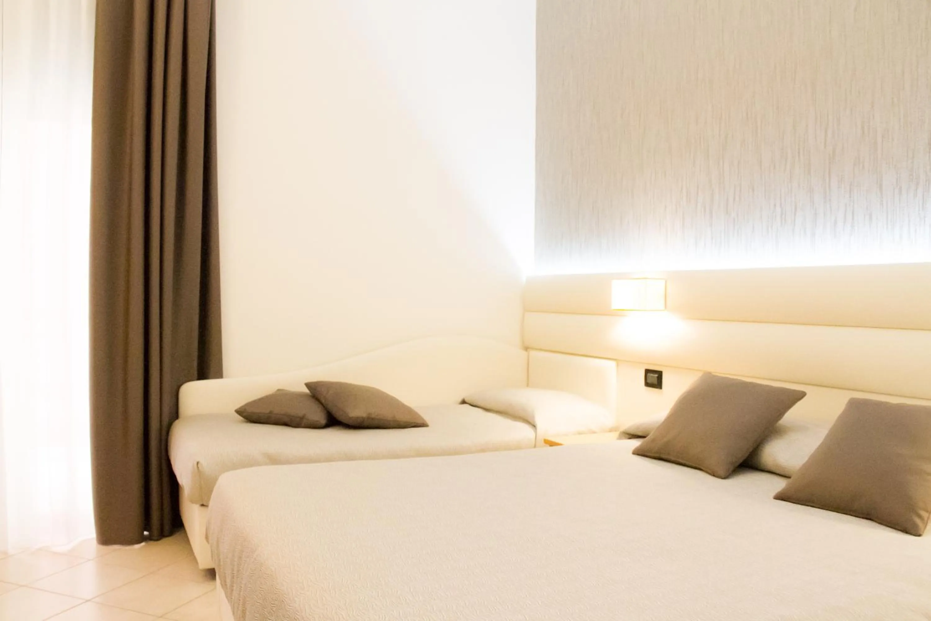 Bedroom in Hotel La Conchiglia