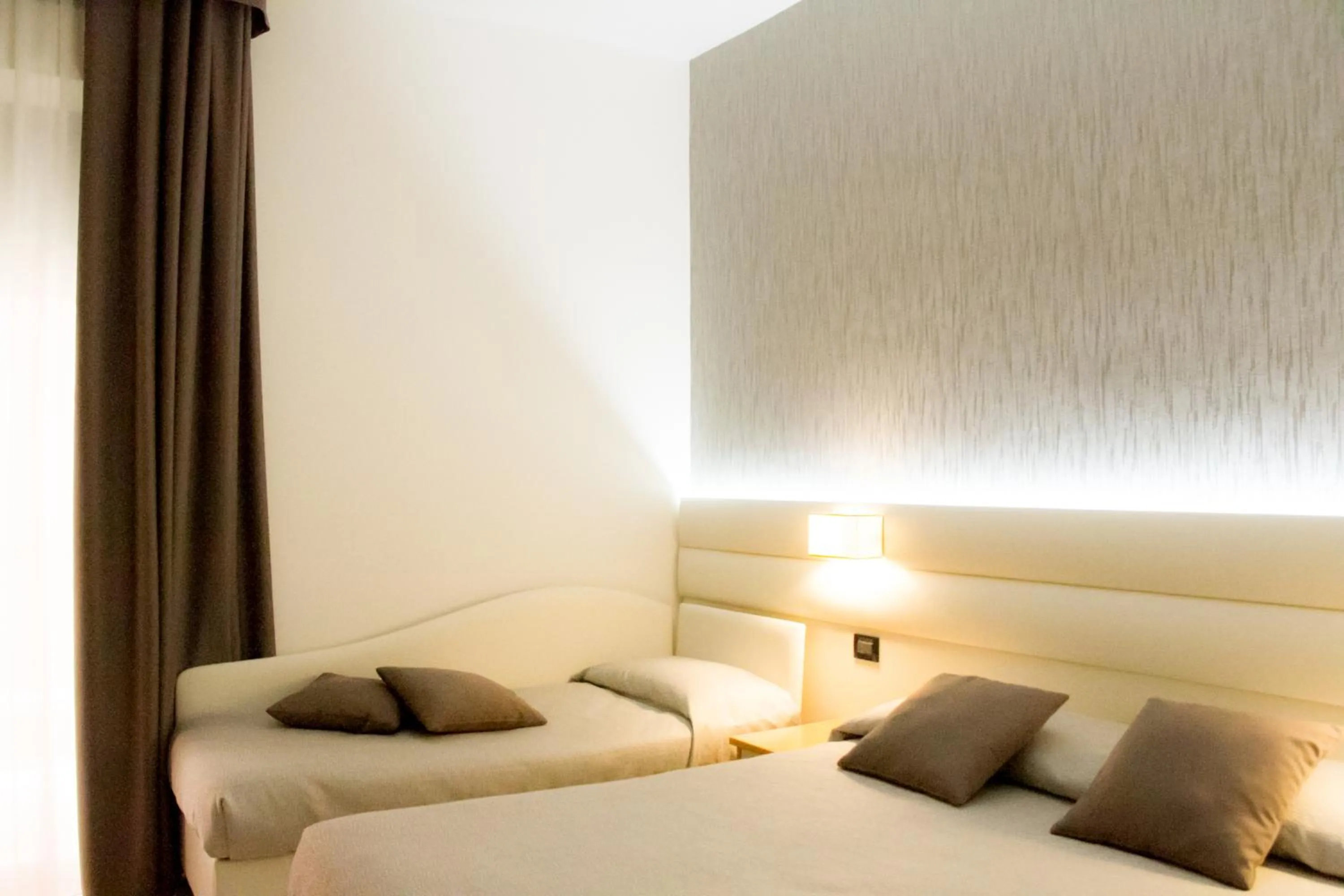 Bedroom in Hotel La Conchiglia