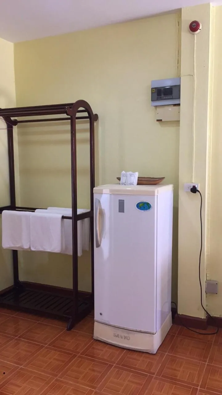 Bed in Poon Suk Hotel Kabin Buri