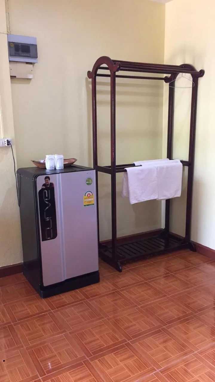 Bed in Poon Suk Hotel Kabin Buri