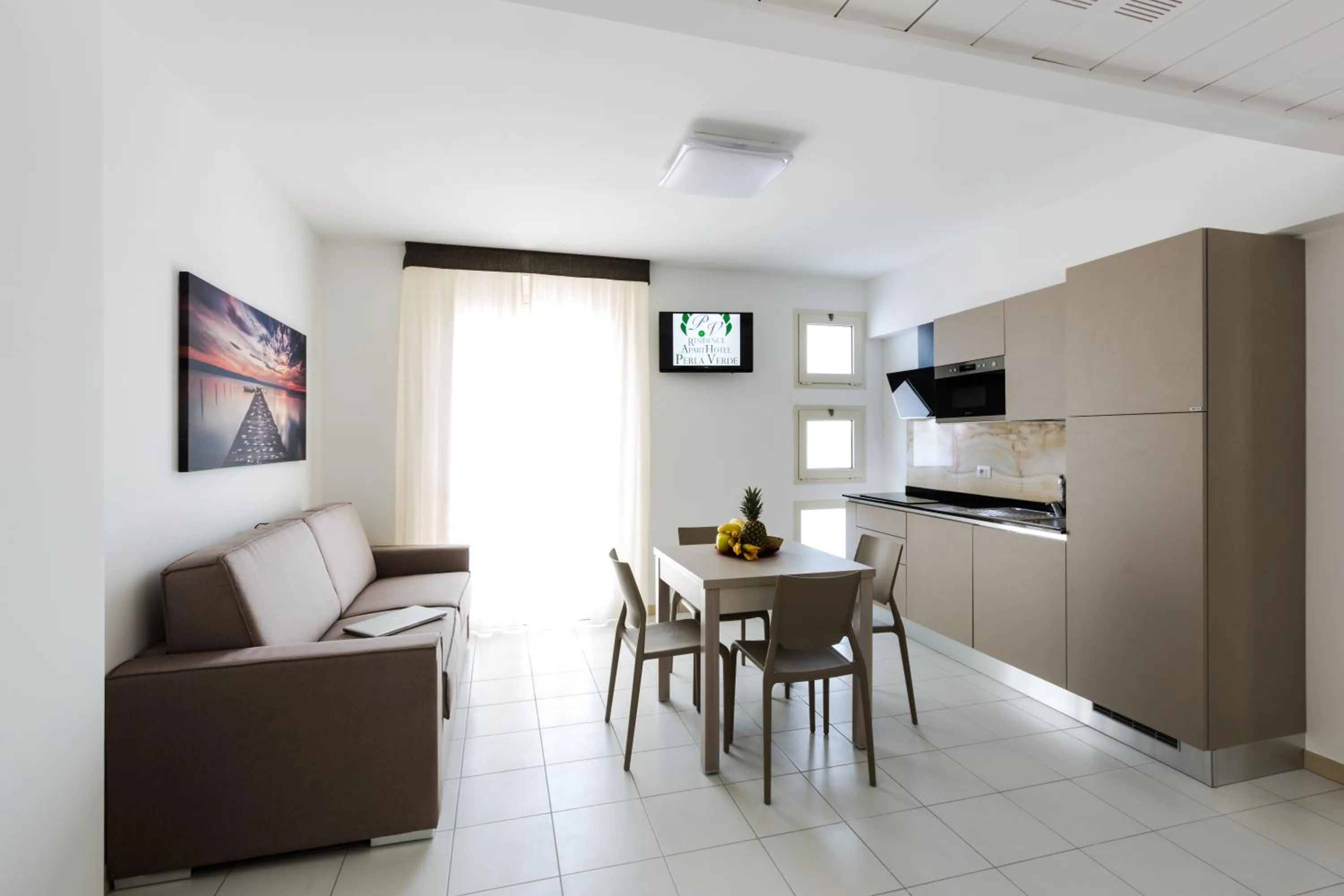 Dining area in Residence Perla Verde