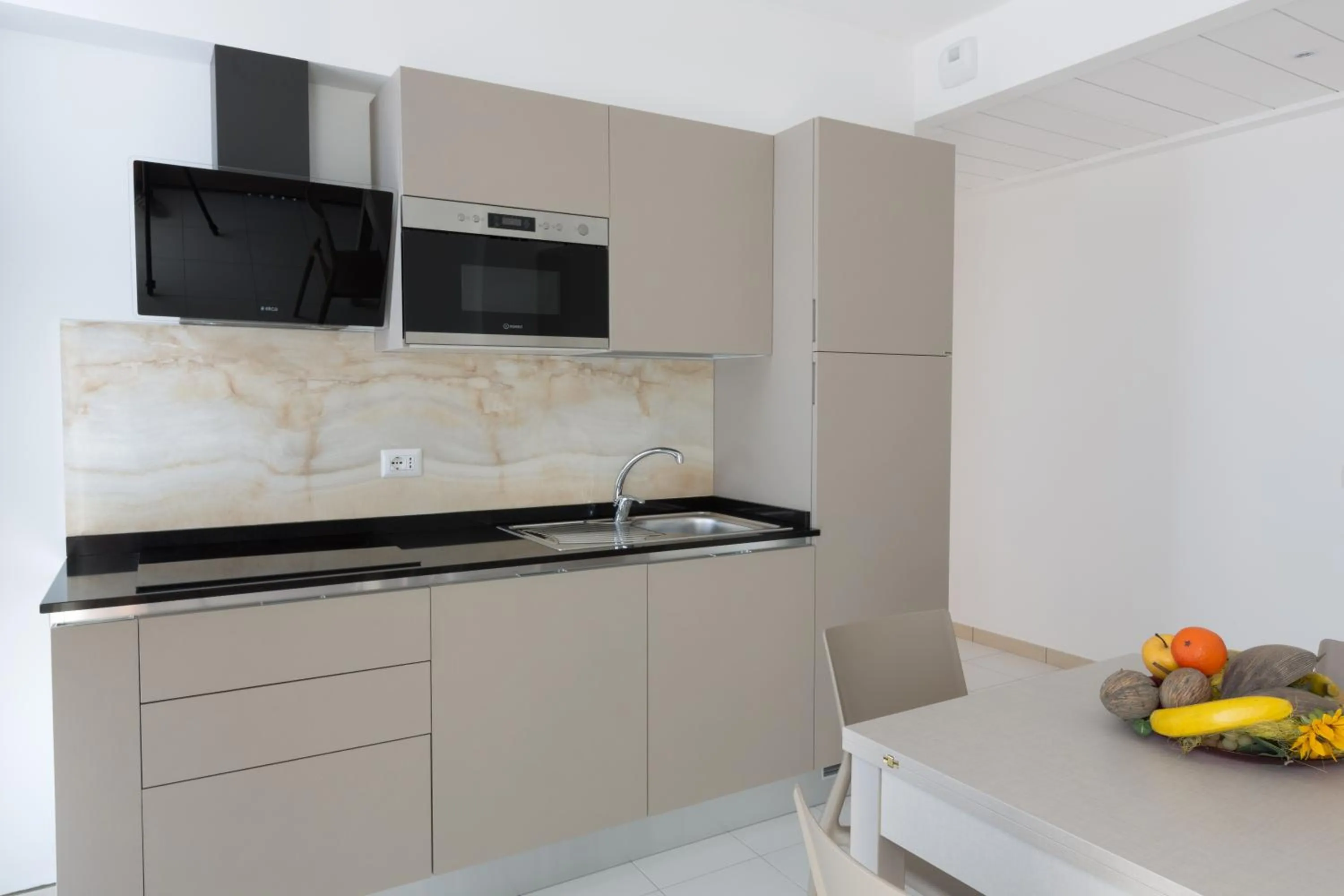 Kitchen or kitchenette in Residence Perla Verde