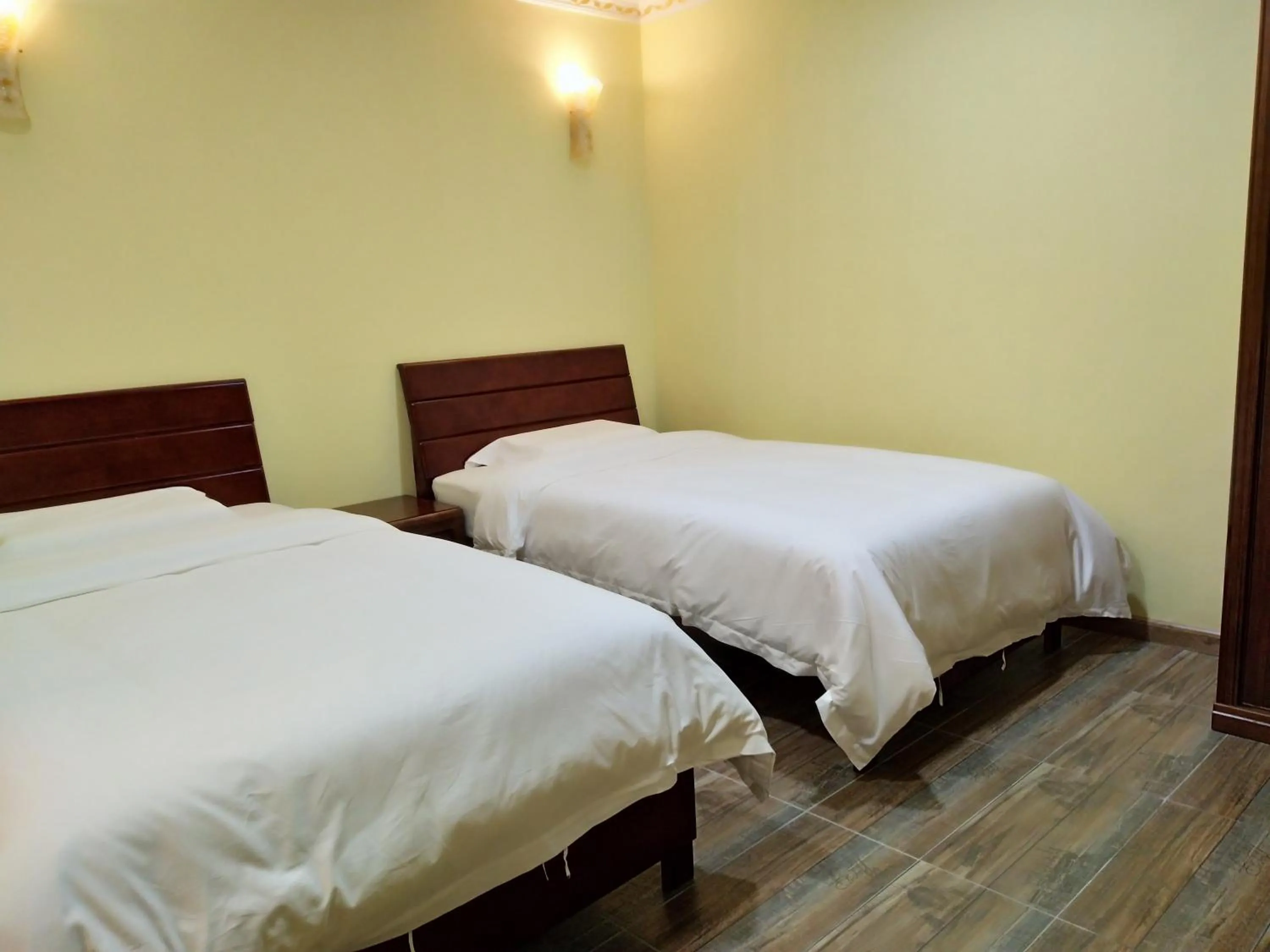 Bed in Uncle Ho Motel