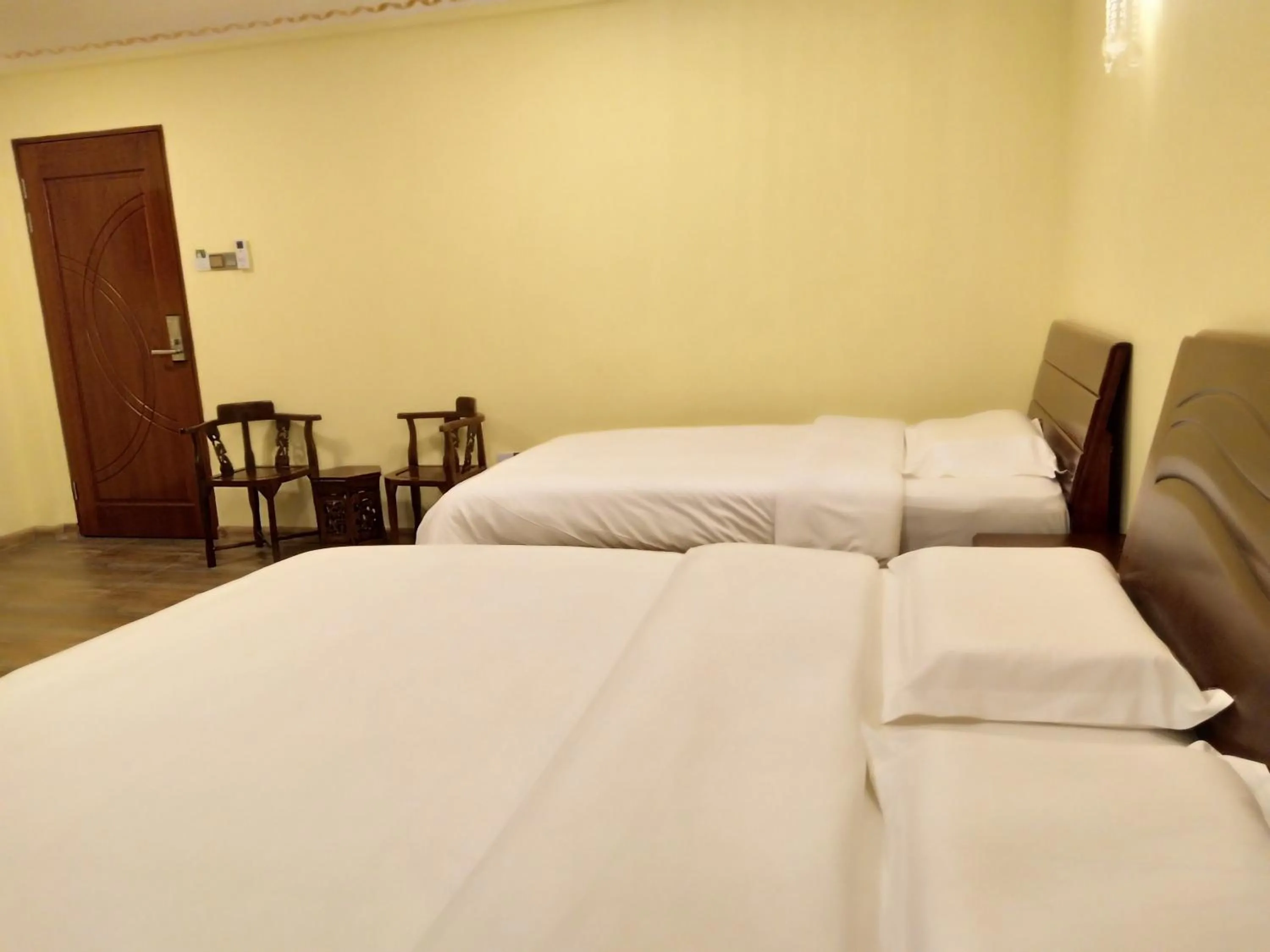 Bed in Uncle Ho Motel