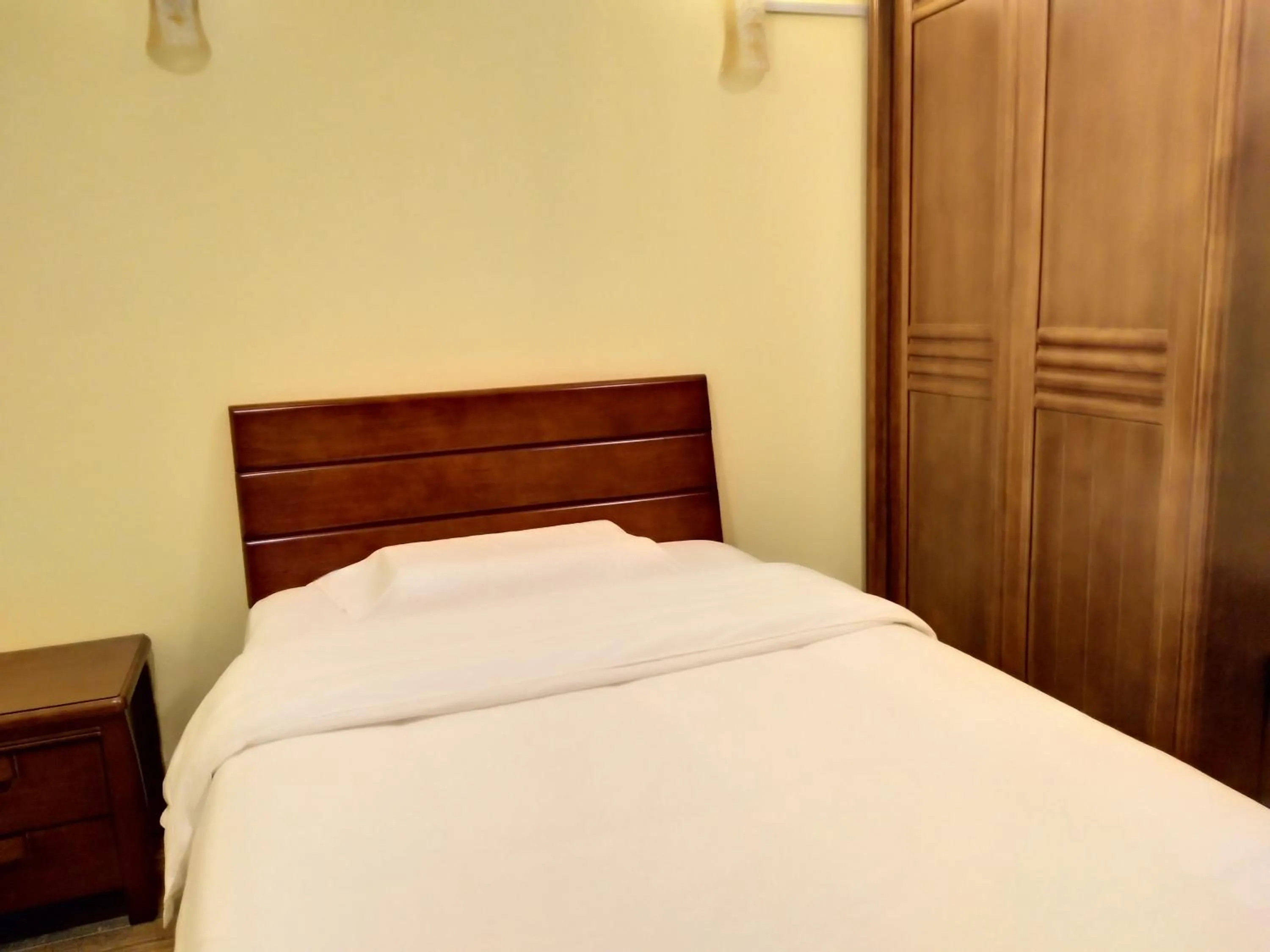 Bed in Uncle Ho Motel
