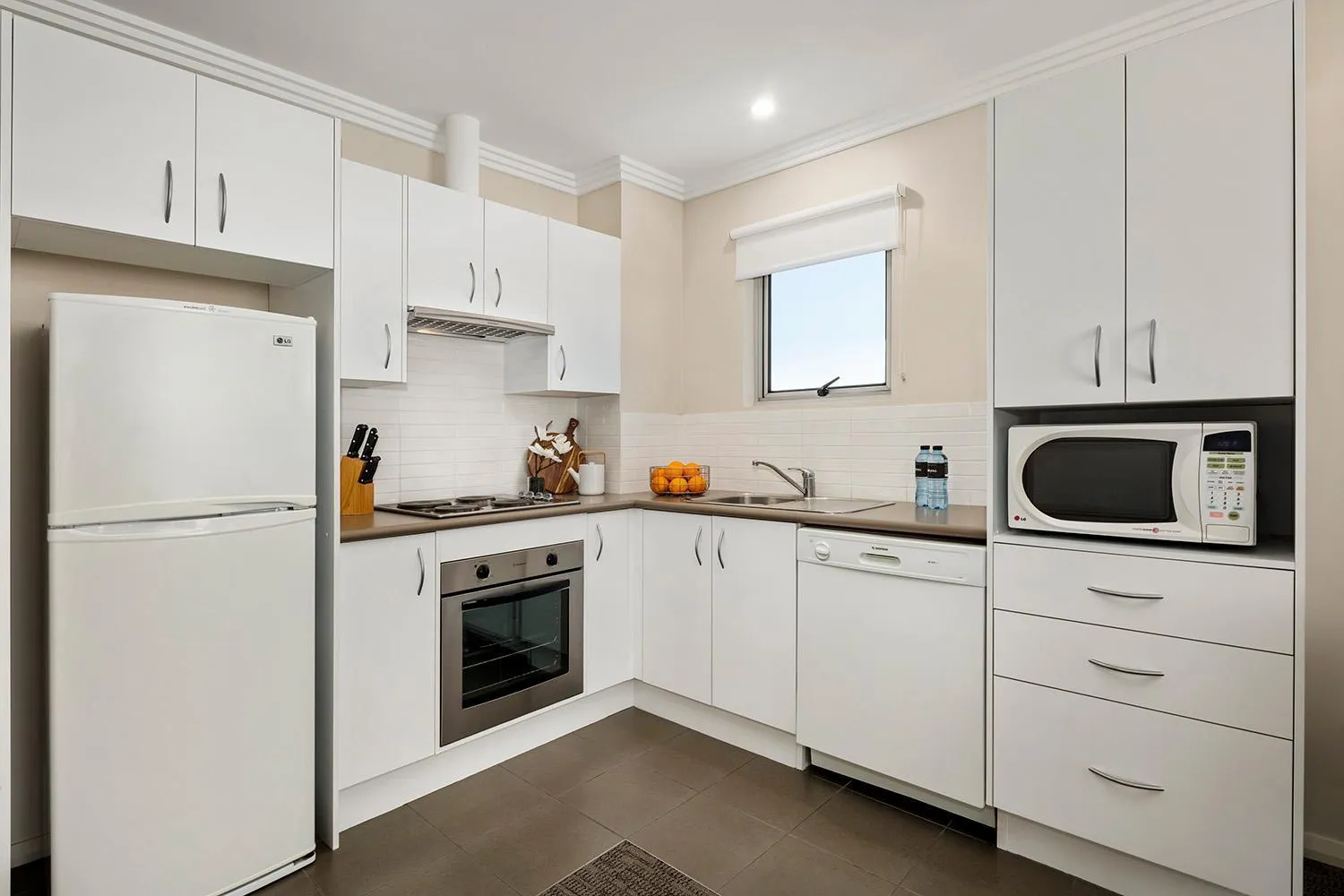Kitchen or kitchenette in Quest Wollongong