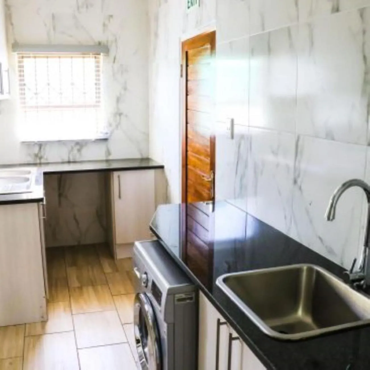 washing machine in Estoby Executive guest house