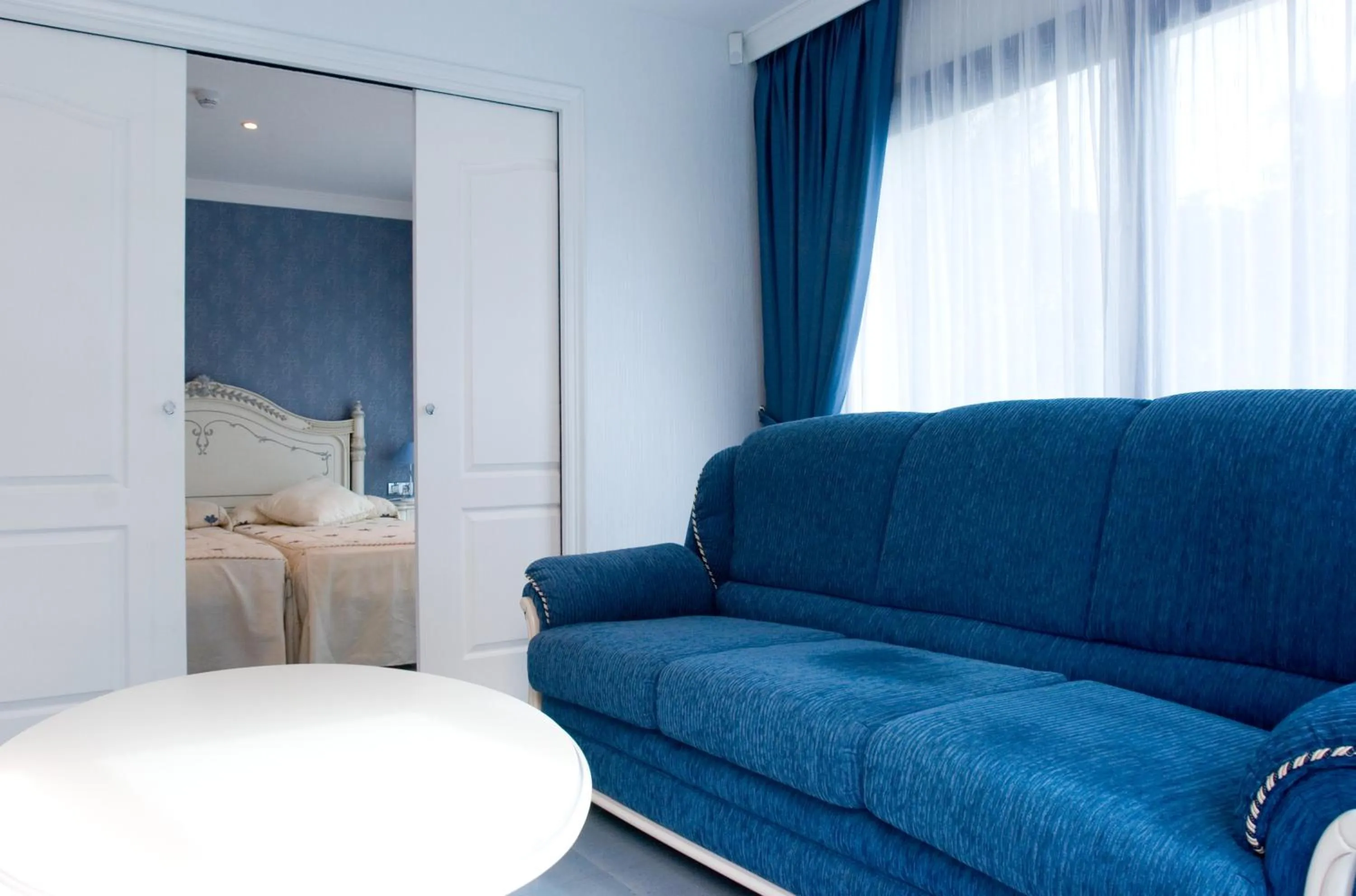 Living room, Bed in Masd Mediterraneo Hotel Apartamentos Spa