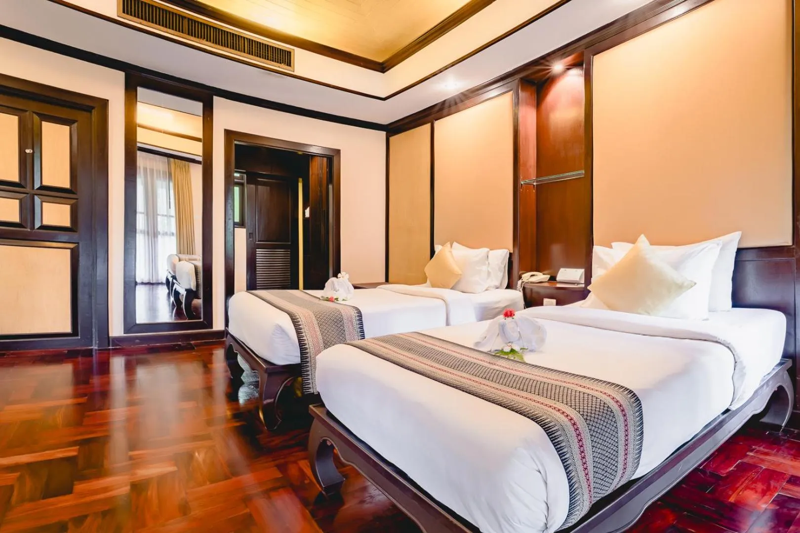 Bed in Khaolak Palm Beach Resort