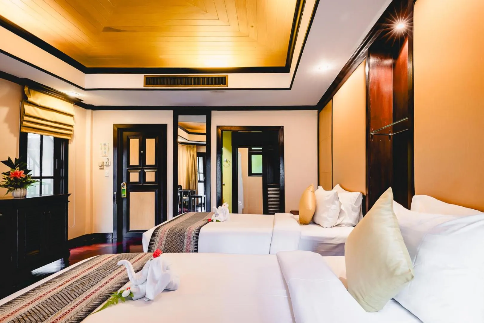 Bed in Khaolak Palm Beach Resort