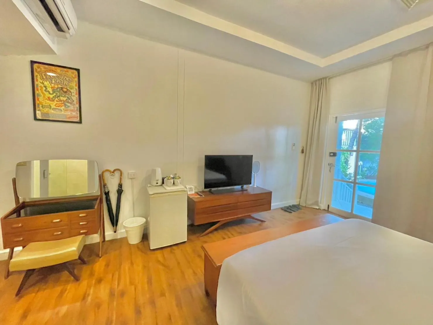 Bed in Green Gallery Beach Boutique Hotel