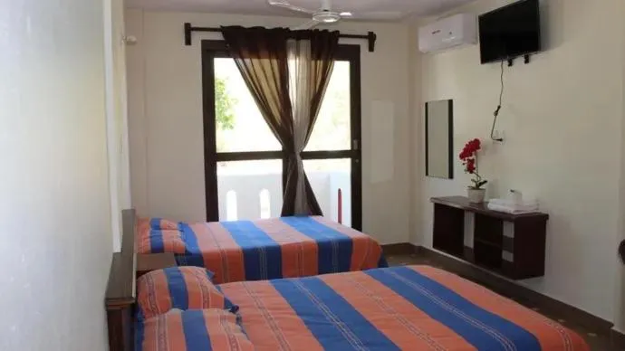 Photo of the whole room, Bed in Yuu-Lee Casa Bendita Huatulco