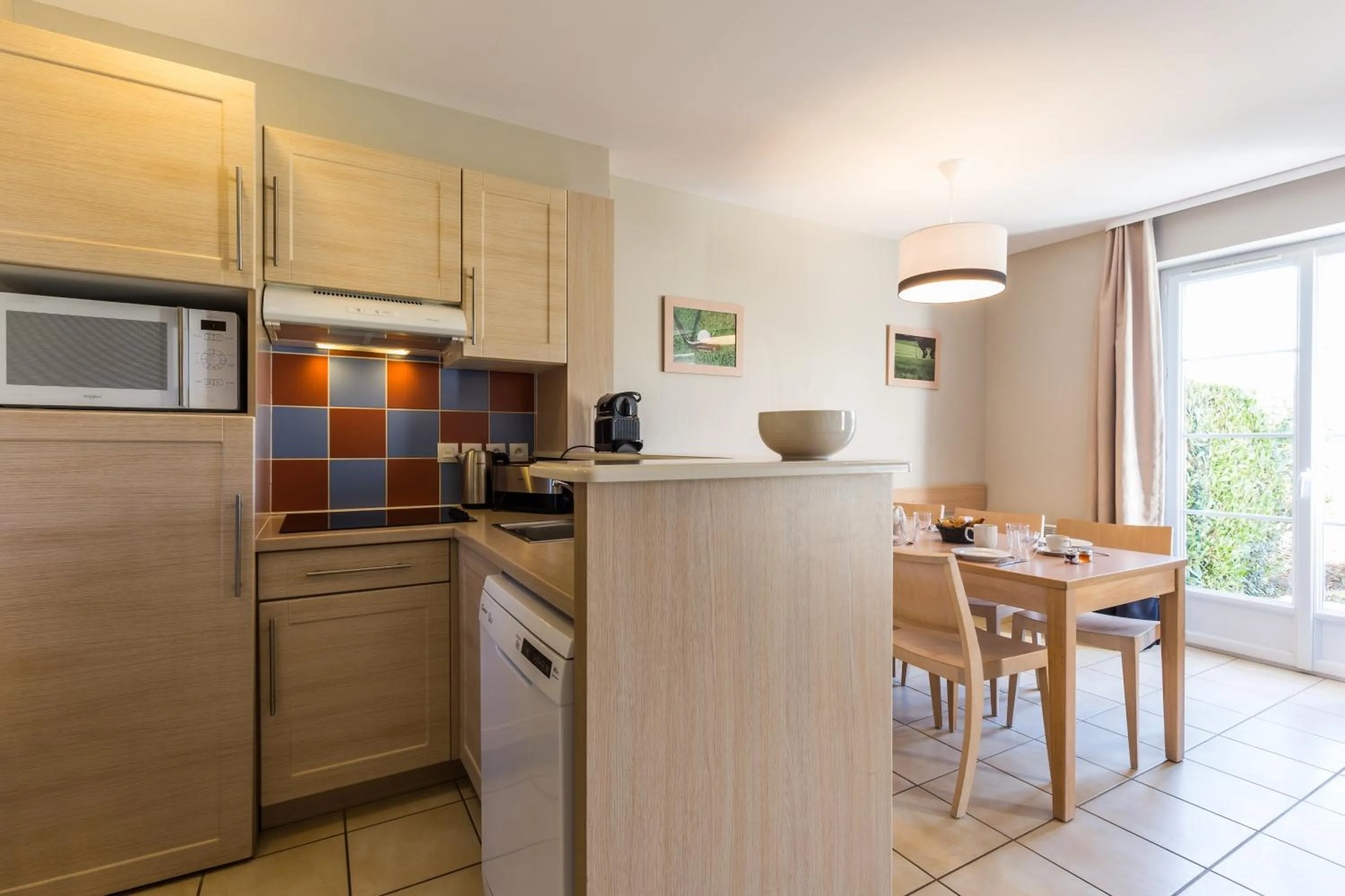 Kitchen or kitchenette in Résidence Pierre & Vacances le Green Beach