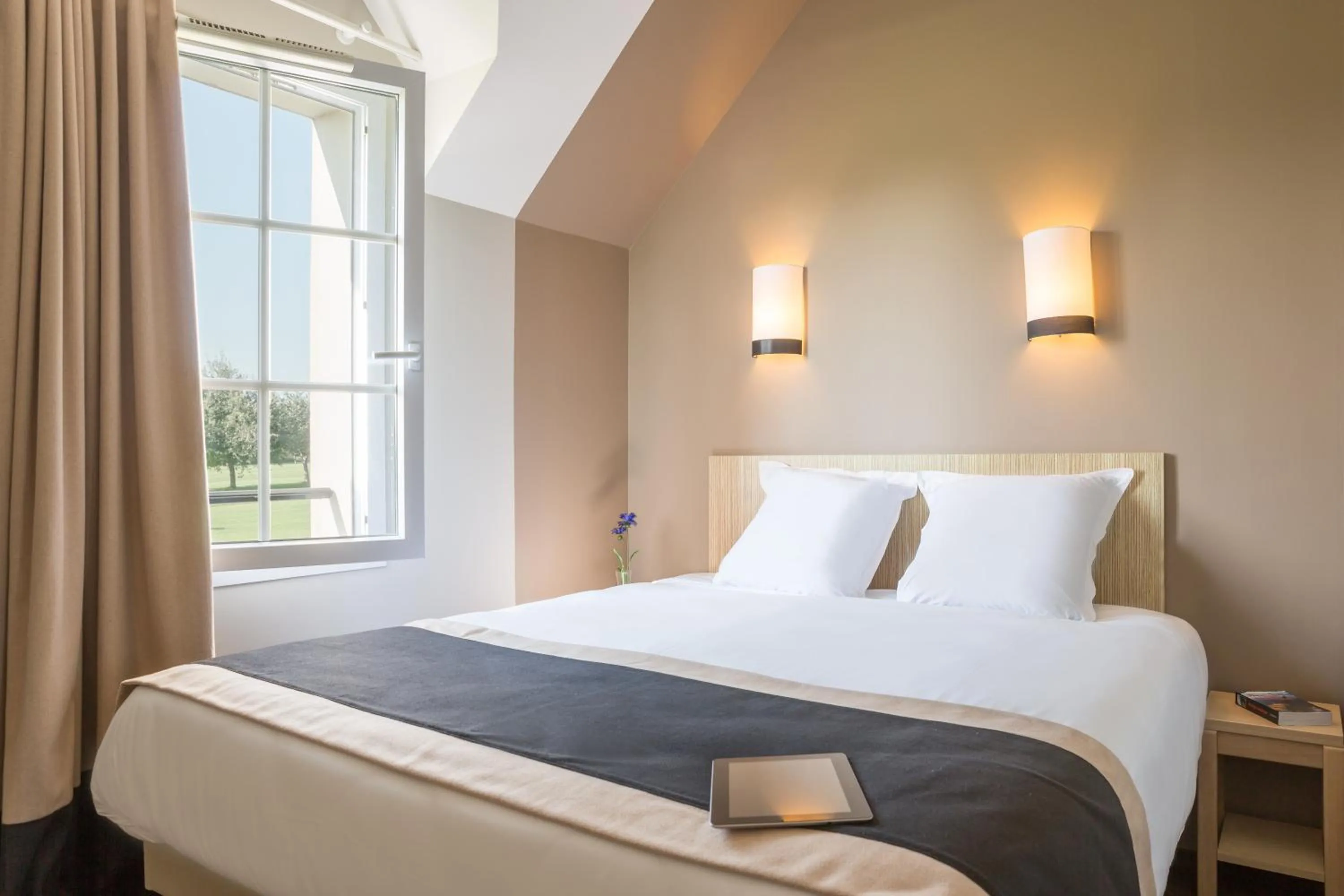 Bed in Résidence Pierre & Vacances le Green Beach