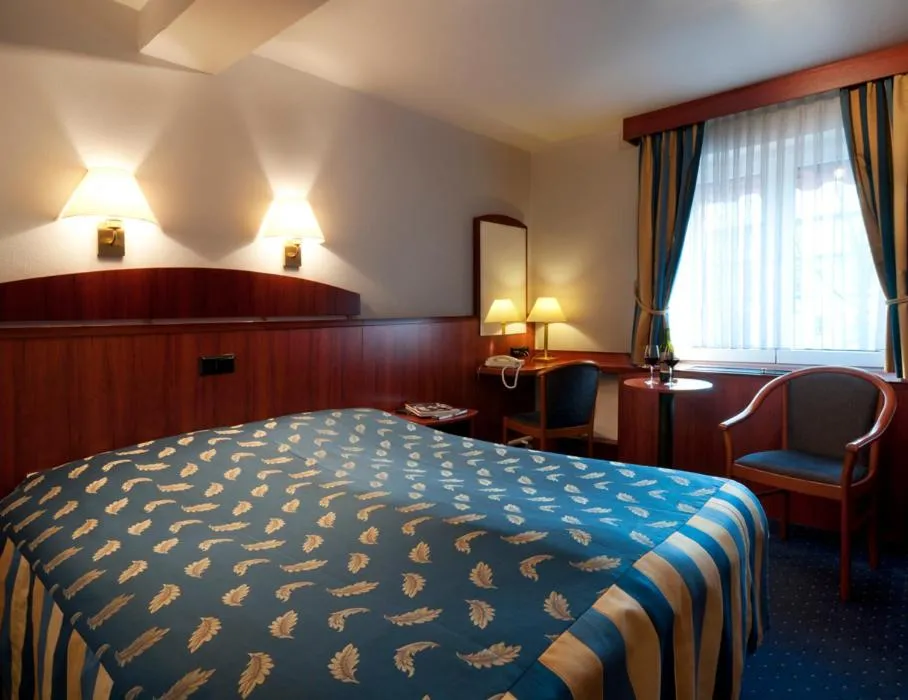 Bed in Hotel Berg en Dal