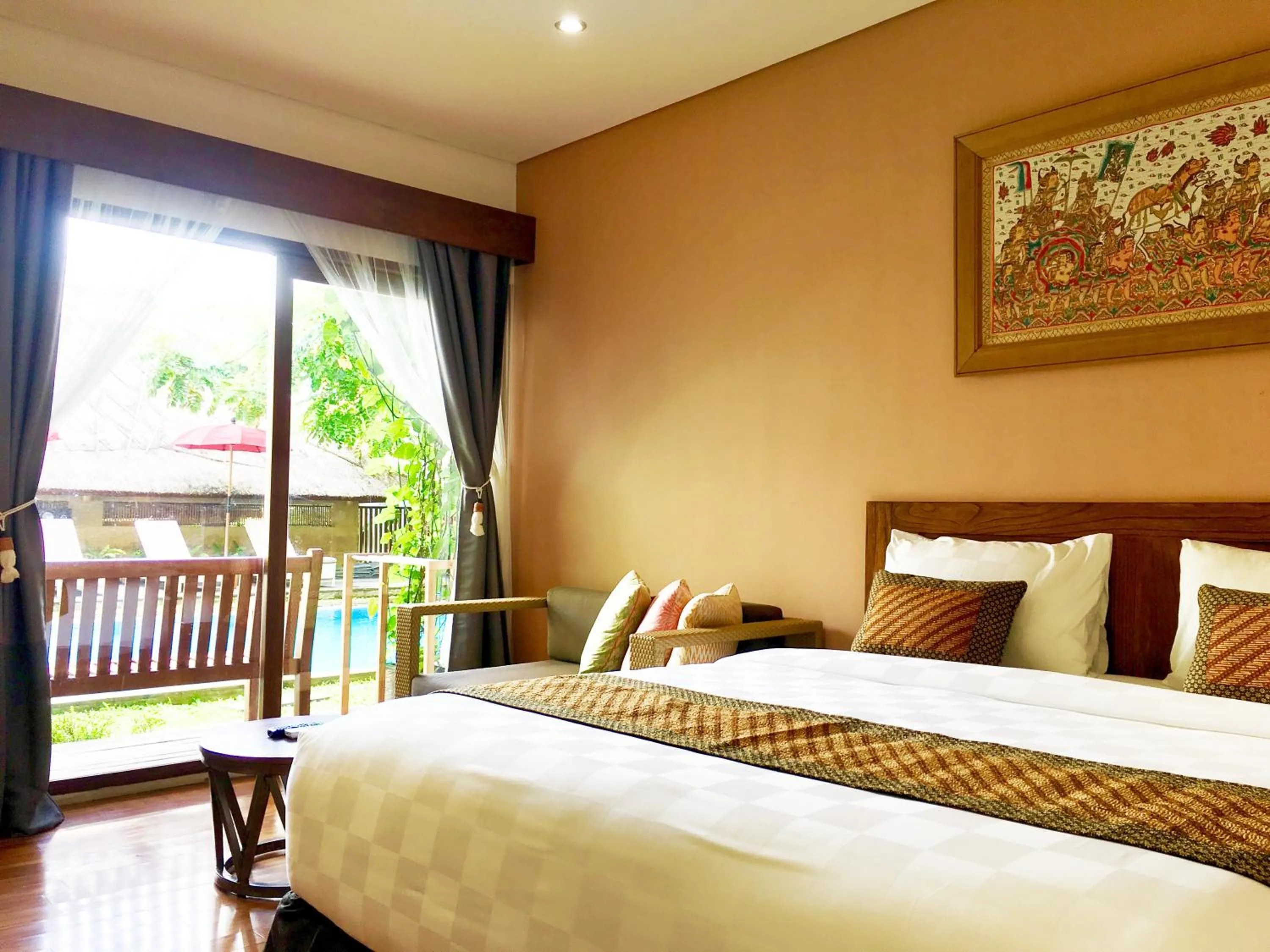 Bed in Hotel Puriartha Ubud
