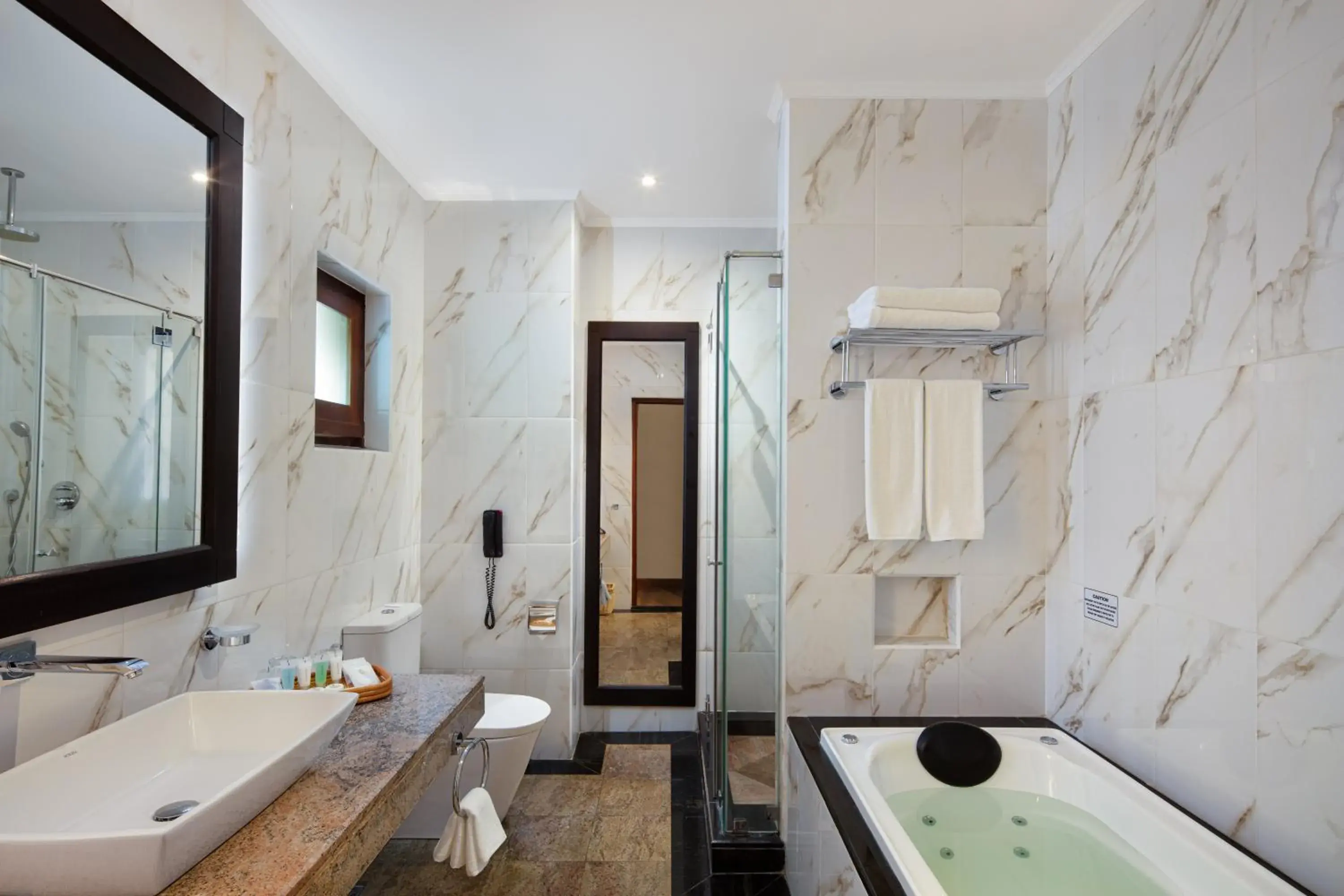 Bathroom in Earl's Regency Hotel Bathroom in Earl's Regency Hotel