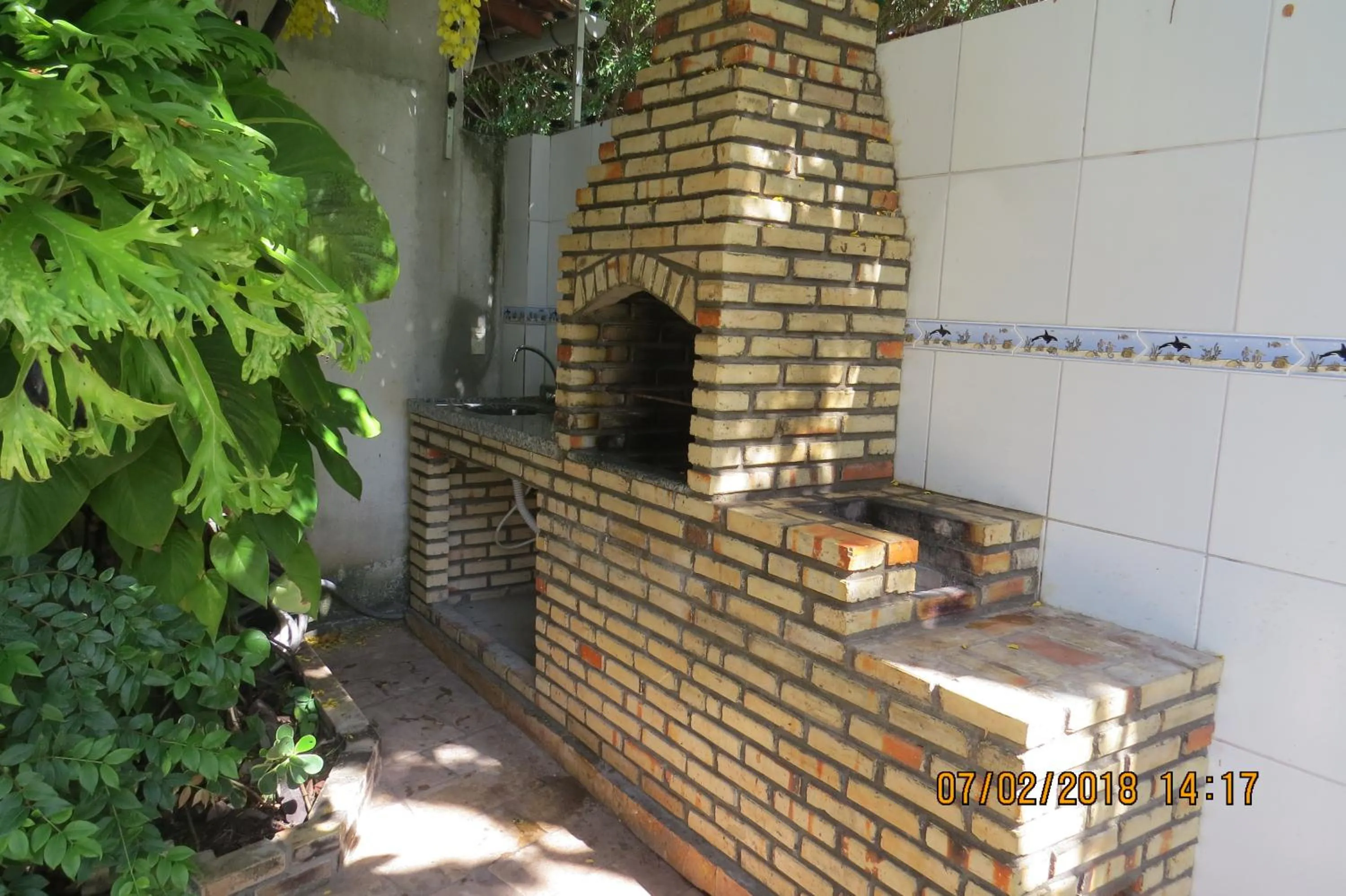 BBQ facilities in Casa Aconchegante Tamandaré