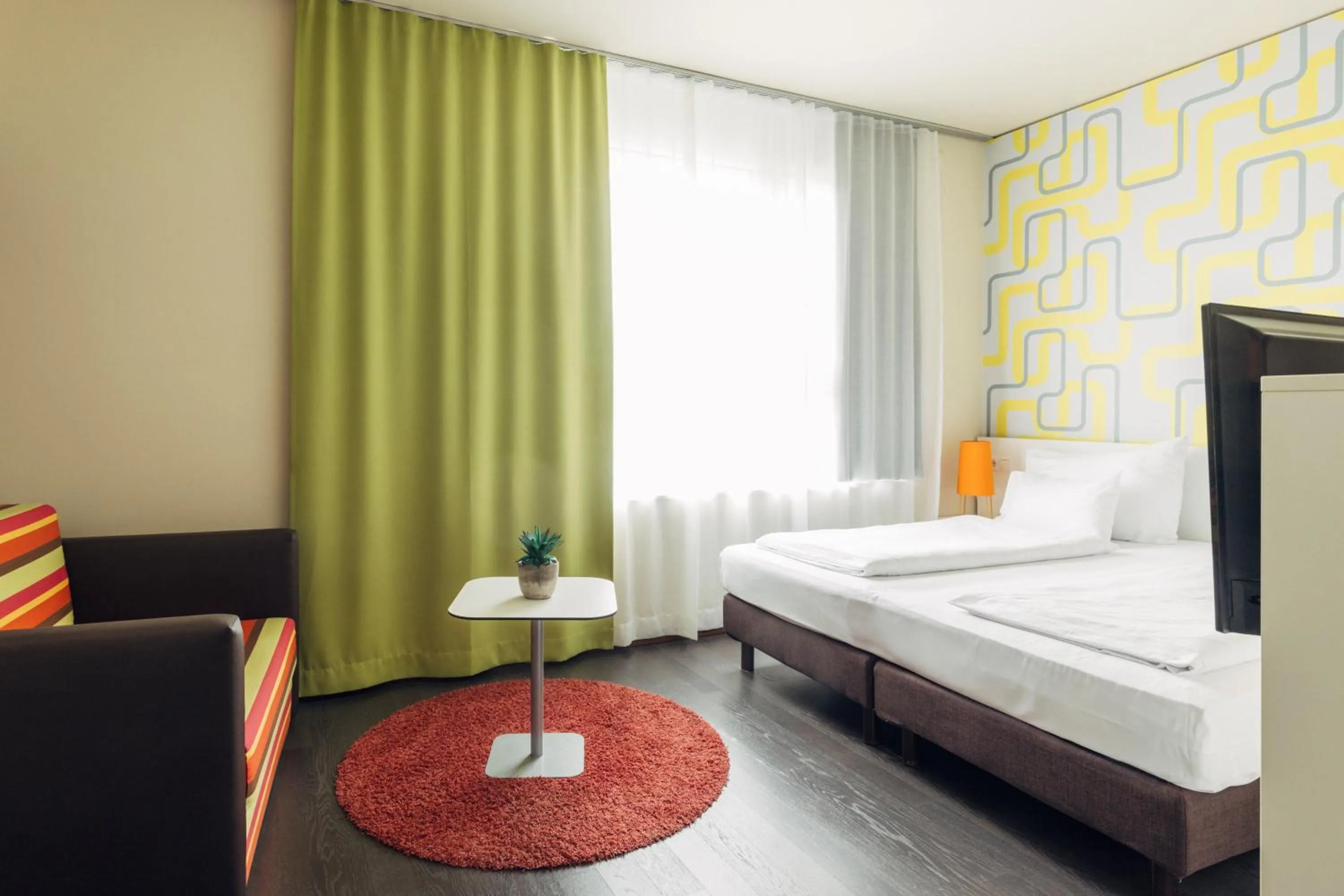 Bed in harry's home Dornbirn hotel & apartments