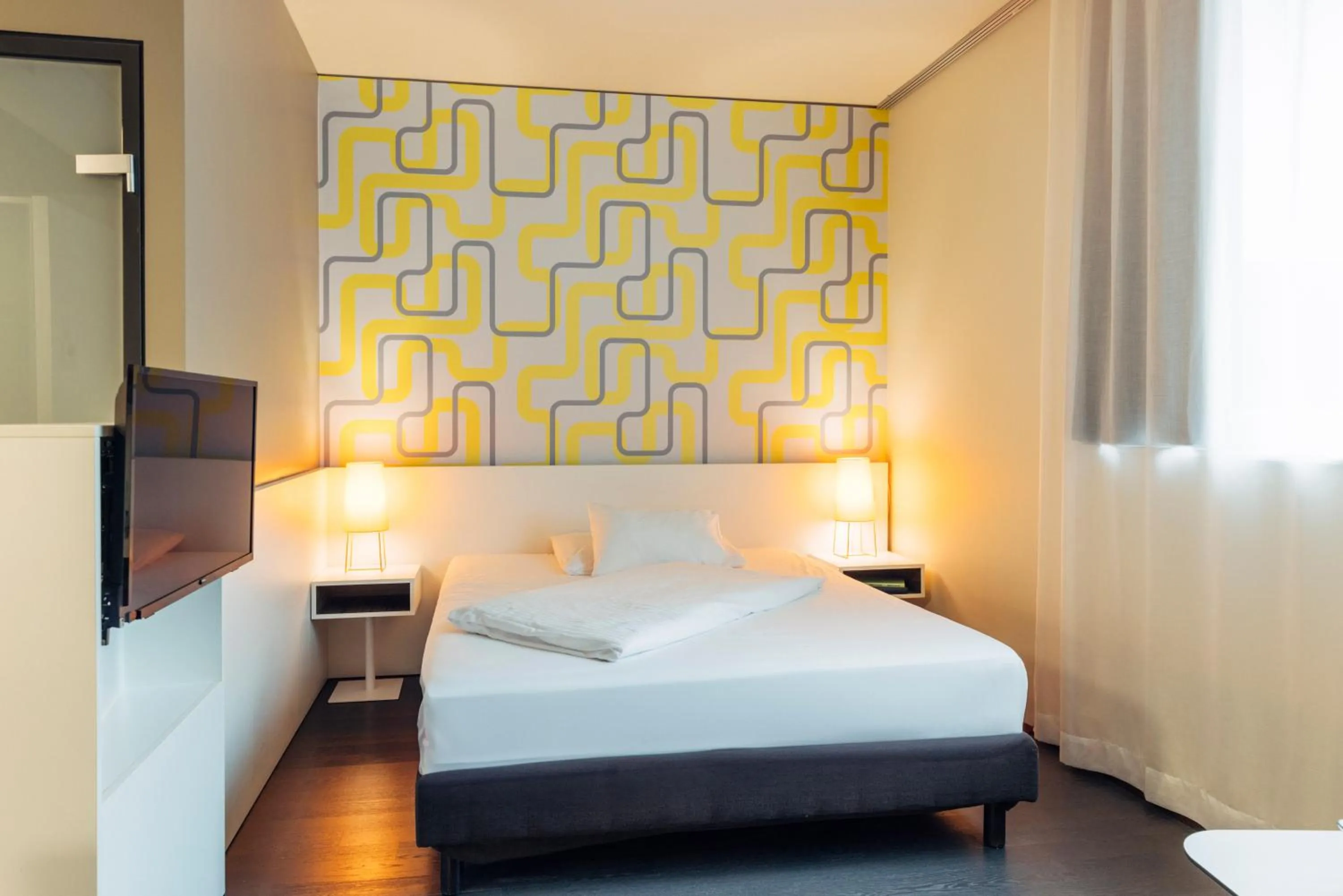 Bed in harry's home Dornbirn hotel & apartments