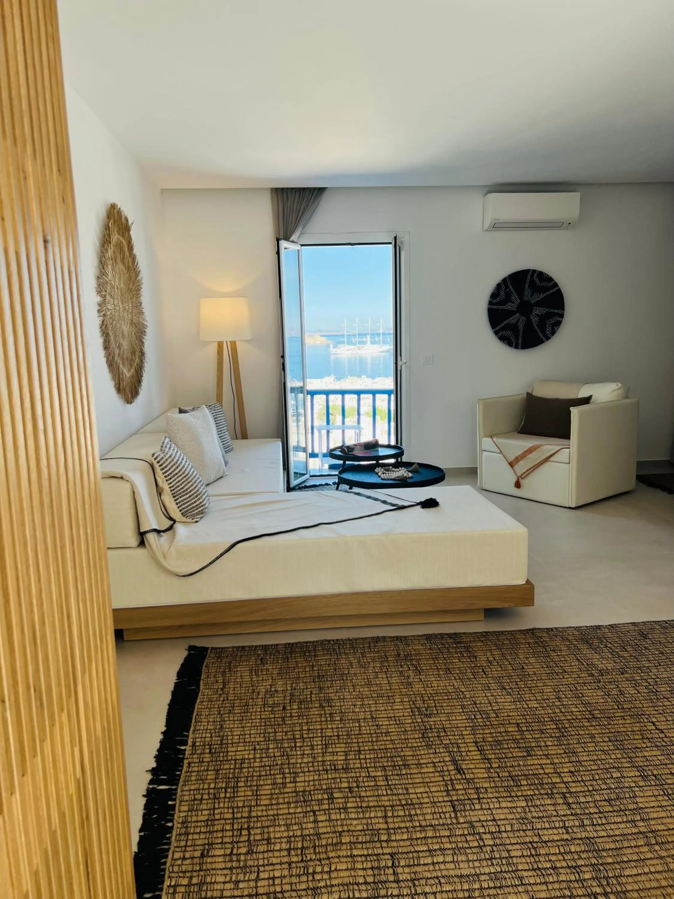 Seating area, Bed in Portobello Boutique Hotel