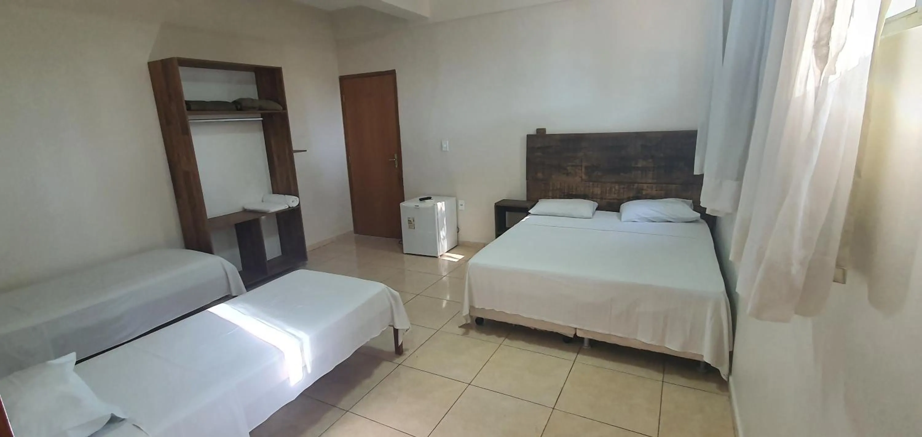 Bed in Trindade Hotel