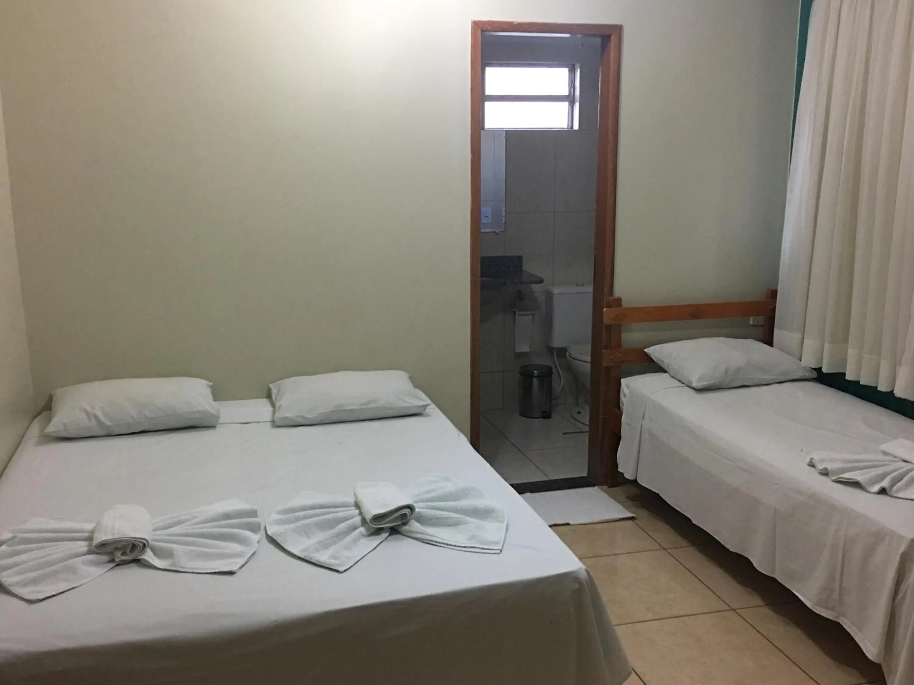 Bed in Trindade Hotel